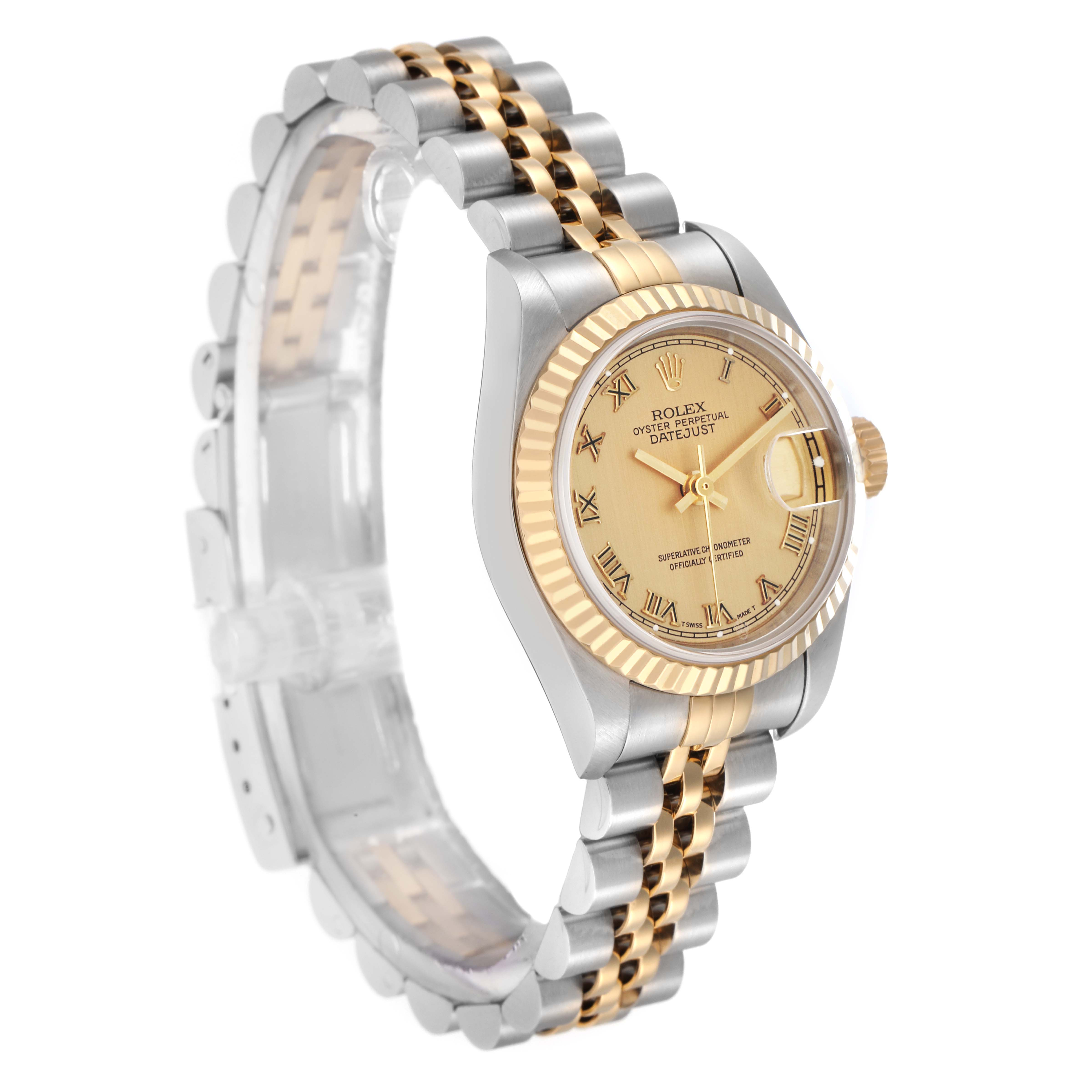 The Rolex Datejust 79173 Women
s Steel and Gold (two tone) Champagne Dial watch is shown at a slight angle, highlighting its gold and silver jubilee bracelet, fluted bezel, and champagne dial.