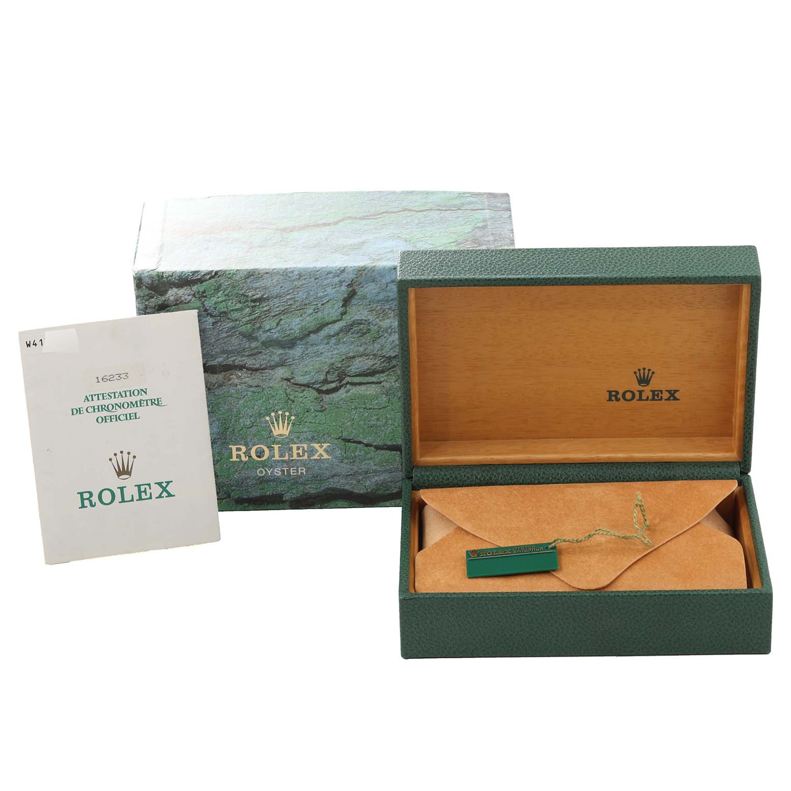 The image shows an open Rolex box with a booklet, tag, and envelope for the Datejust model.