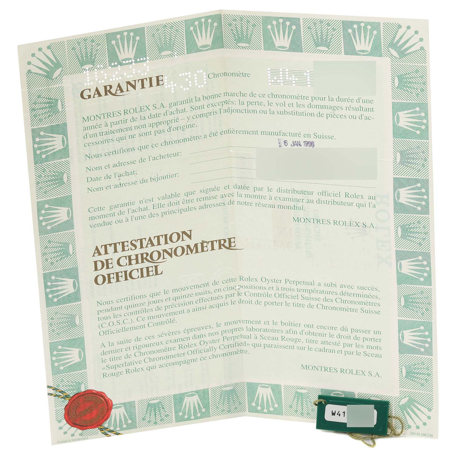 Image shows the warranty and chronometer certification paper for a Rolex Datejust 16233 Men's Steel and Gold (two tone) White Dial 16233 Men's Steel and Gold (two tone) White Dial model.