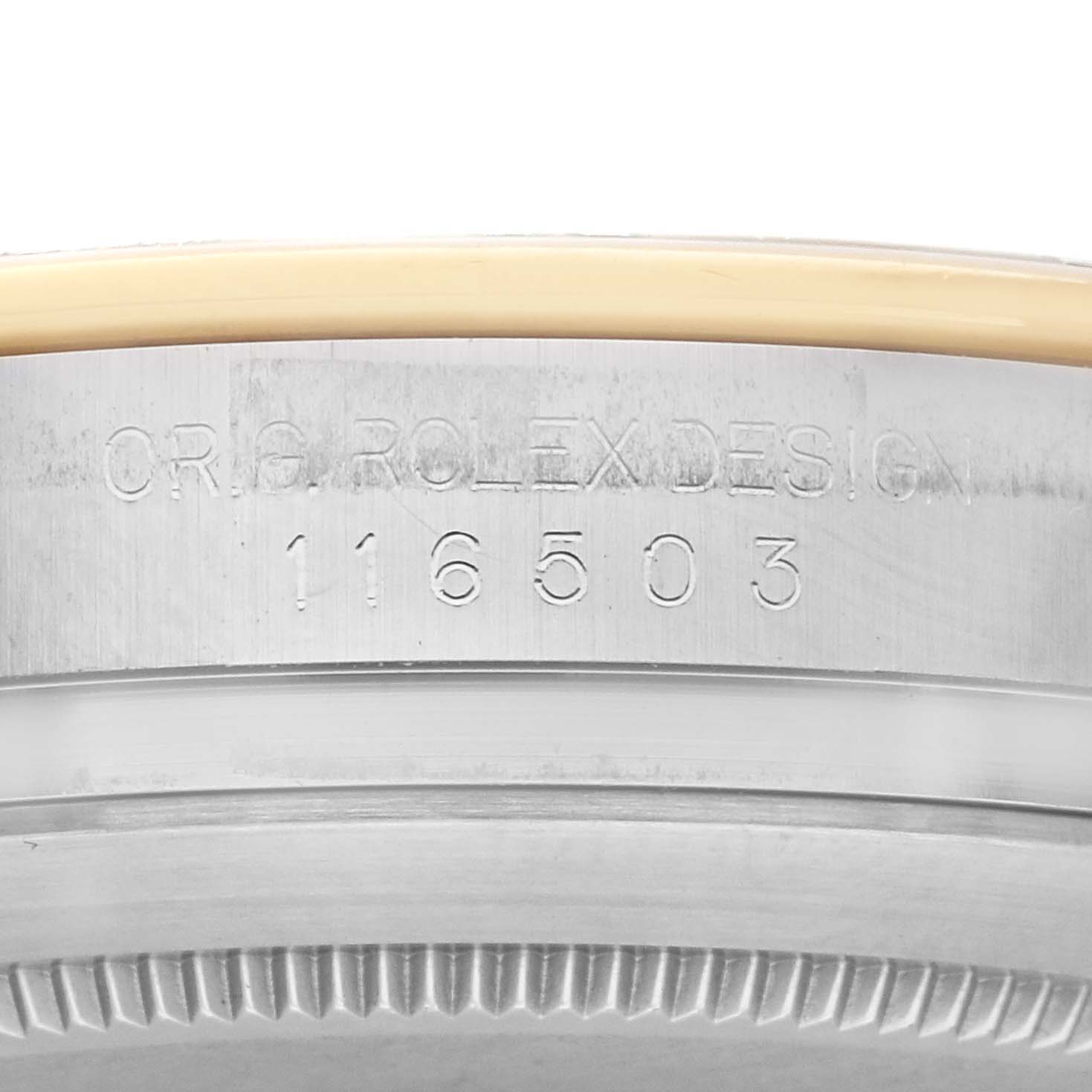 This image shows the side of the case of a Rolex Daytona 116503 Men's Steel and Gold (two tone) Champagne Dial 116503 Men's Steel and Gold (two tone) Champagne Dial watch, highlighting its engraved model number, 116503.