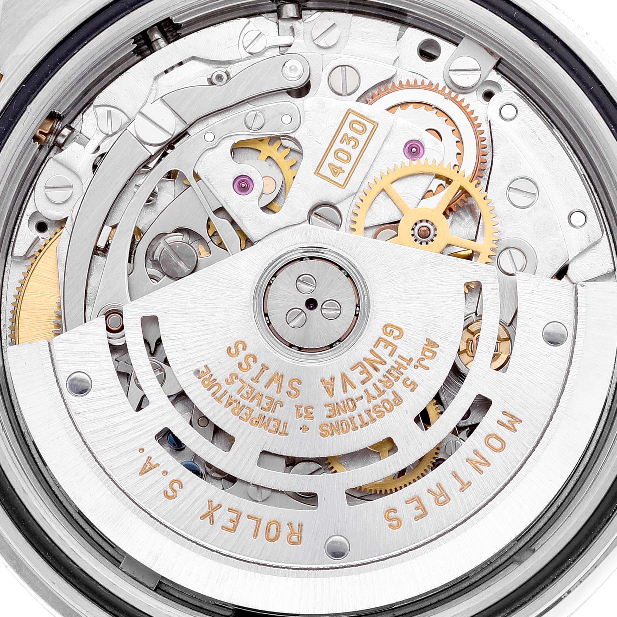 This image shows the intricate internal mechanical movement of a Rolex Daytona 16523 Men
s Steel and Gold (two tone) Black Dial 16523 Men
s Steel and Gold (two tone) Black Dial watch, viewed from the back.