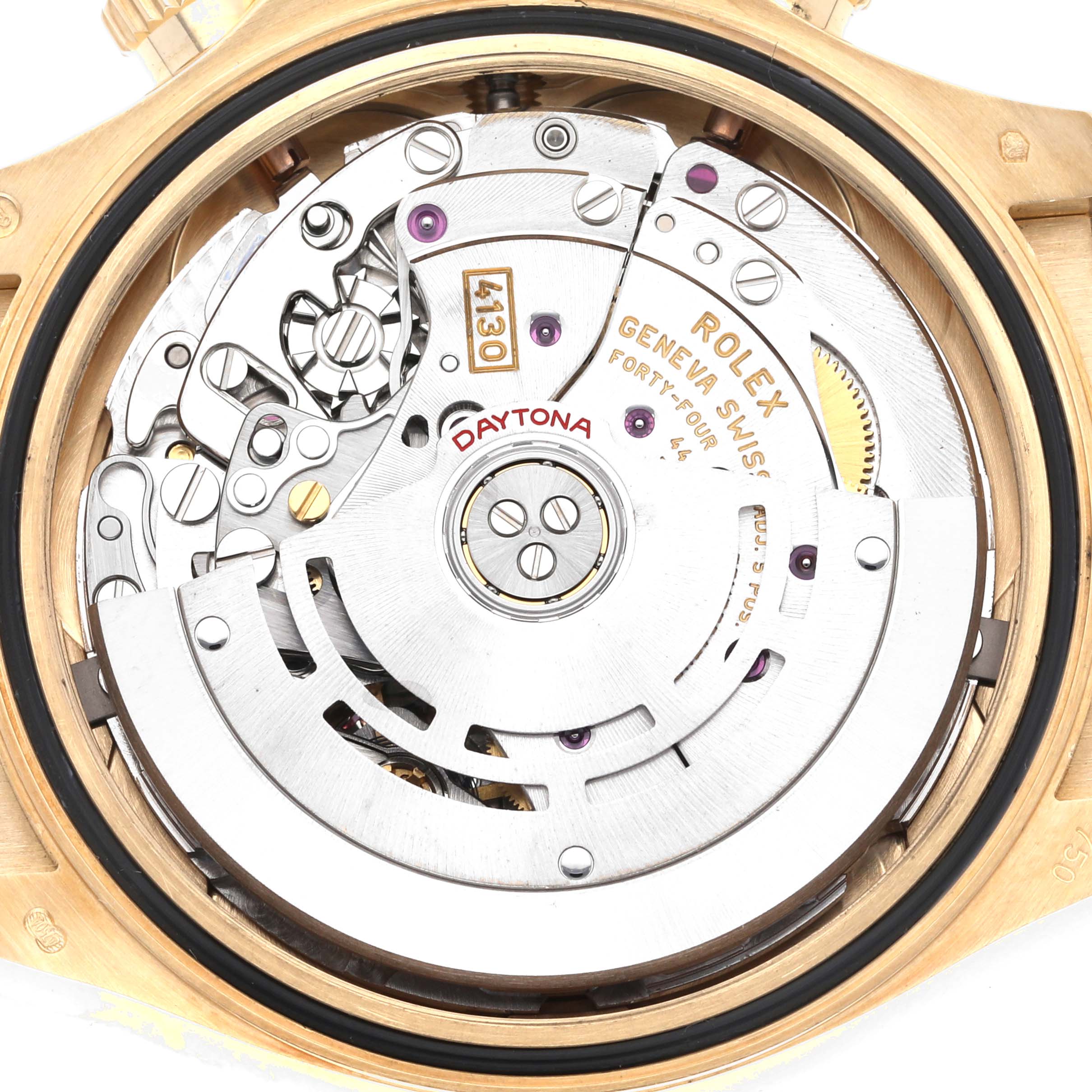 The image shows the inner mechanism of a Rolex Daytona 116518L Men's Yellow Gold Black Dial 116518L Men's Yellow Gold Black Dial watch, revealing the movement and components.