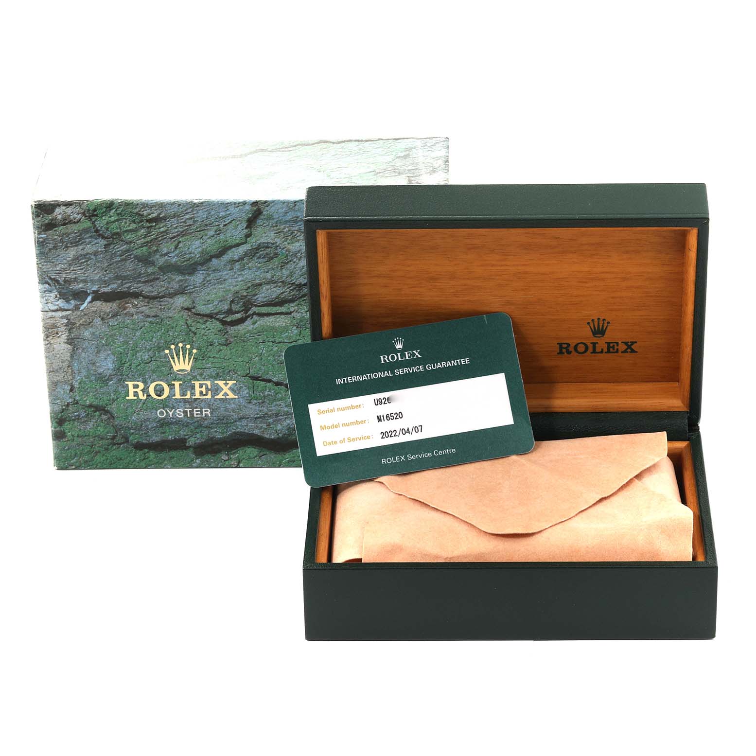 The image shows the packaging, inner box, and guarantee card for a Rolex Daytona 16520 Men's Stainless Steel Black Dial 16520 Men's Stainless Steel Black Dial watch.