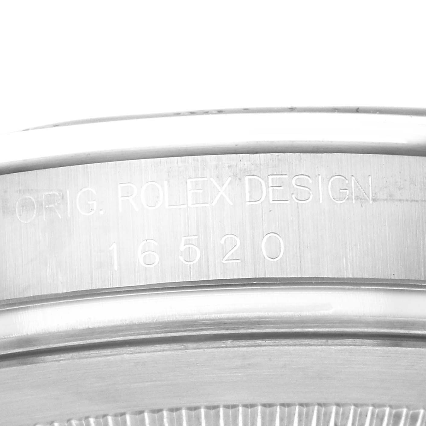 This image shows a close-up of the case side of a Rolex Daytona 16520 Men's Stainless Steel Black Dial 16520 Men's Stainless Steel Black Dial watch, highlighting the reference number "16520" and "ORIG. ROLEX DESIGN" engraving.