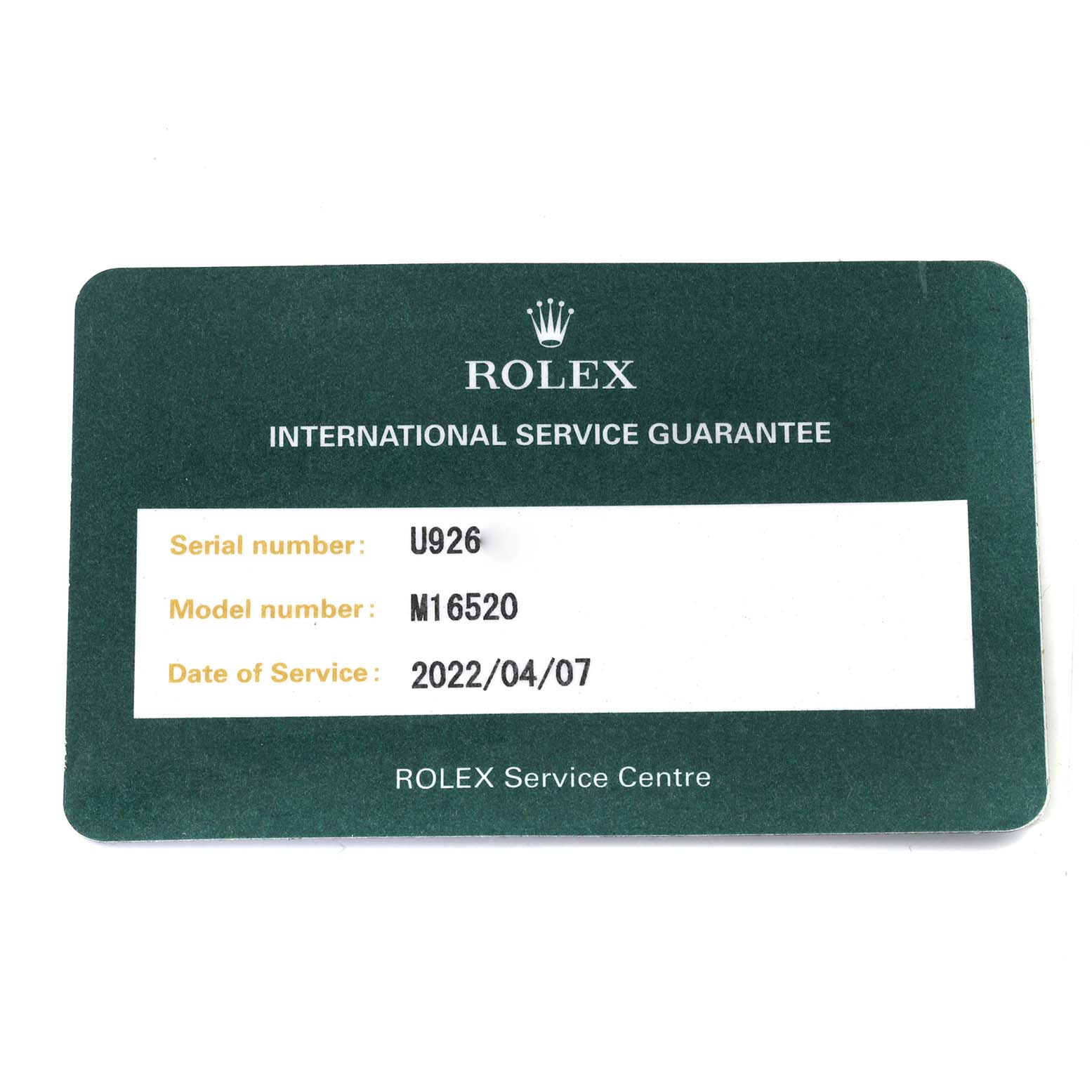 This is a Rolex Service Guarantee card showing serial and model numbers for the Rolex Daytona 16520 Men's Stainless Steel Black Dial 16520 Men's Stainless Steel Black Dial M16520.