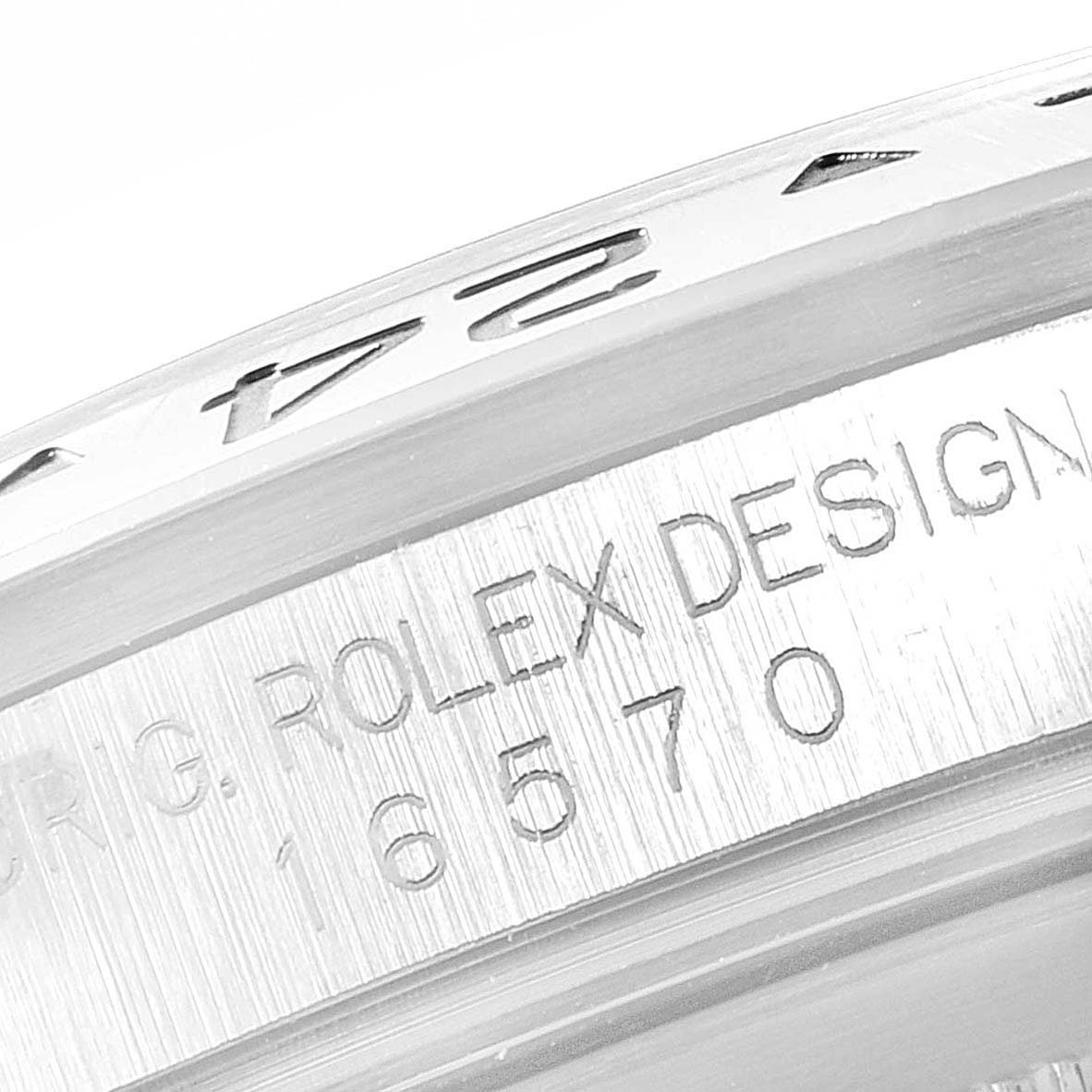 The image shows a close-up view of the bezel and engraved model number of a Rolex Explorer 16570 Men
s Stainless Steel Black Dial 16570 Men
s Stainless Steel Black Dial watch.