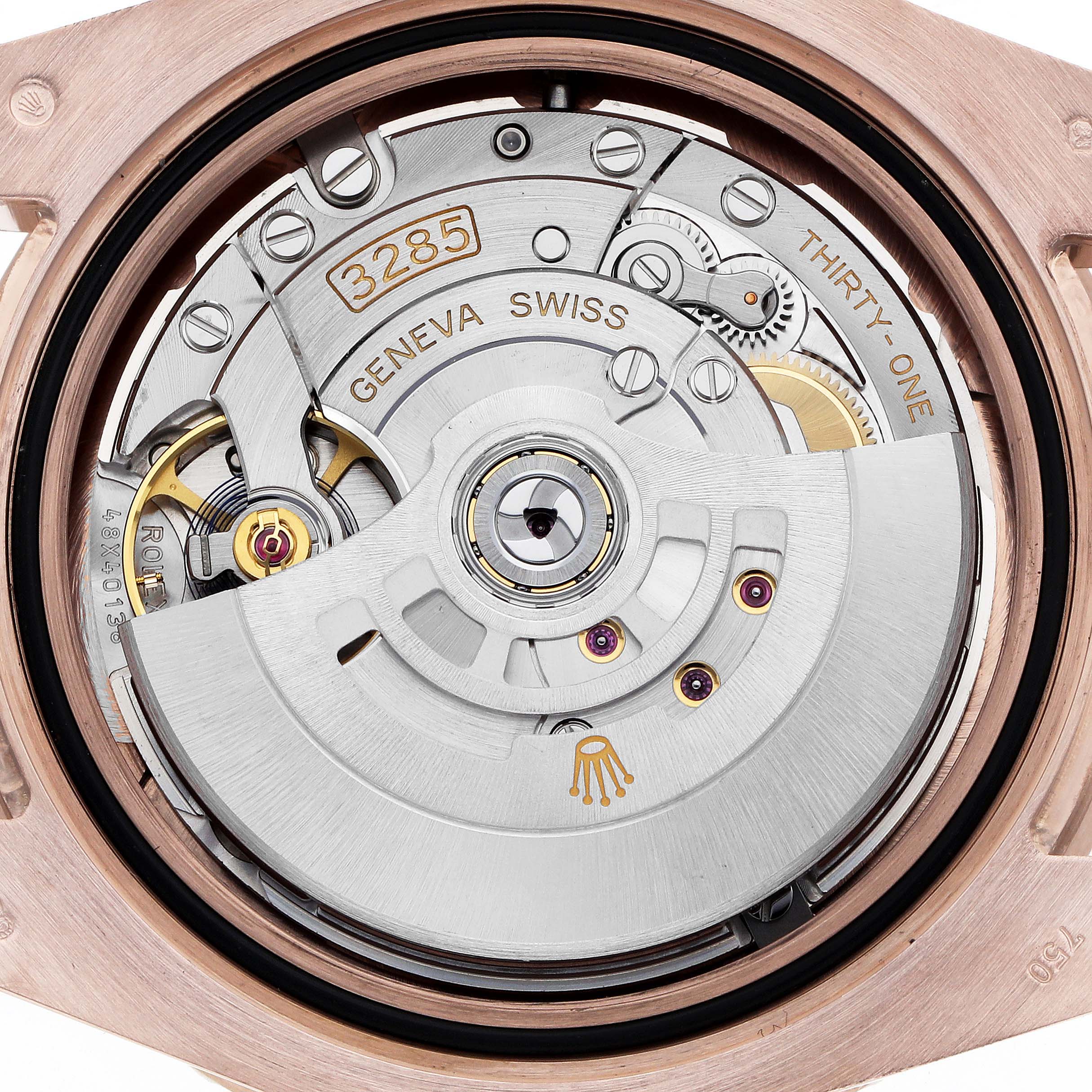 The image shows the open case back angle revealing the movement of the Rolex GMT-Master 126715 Men
s Rose Gold Black Dial watch, featuring the caliber 3285.