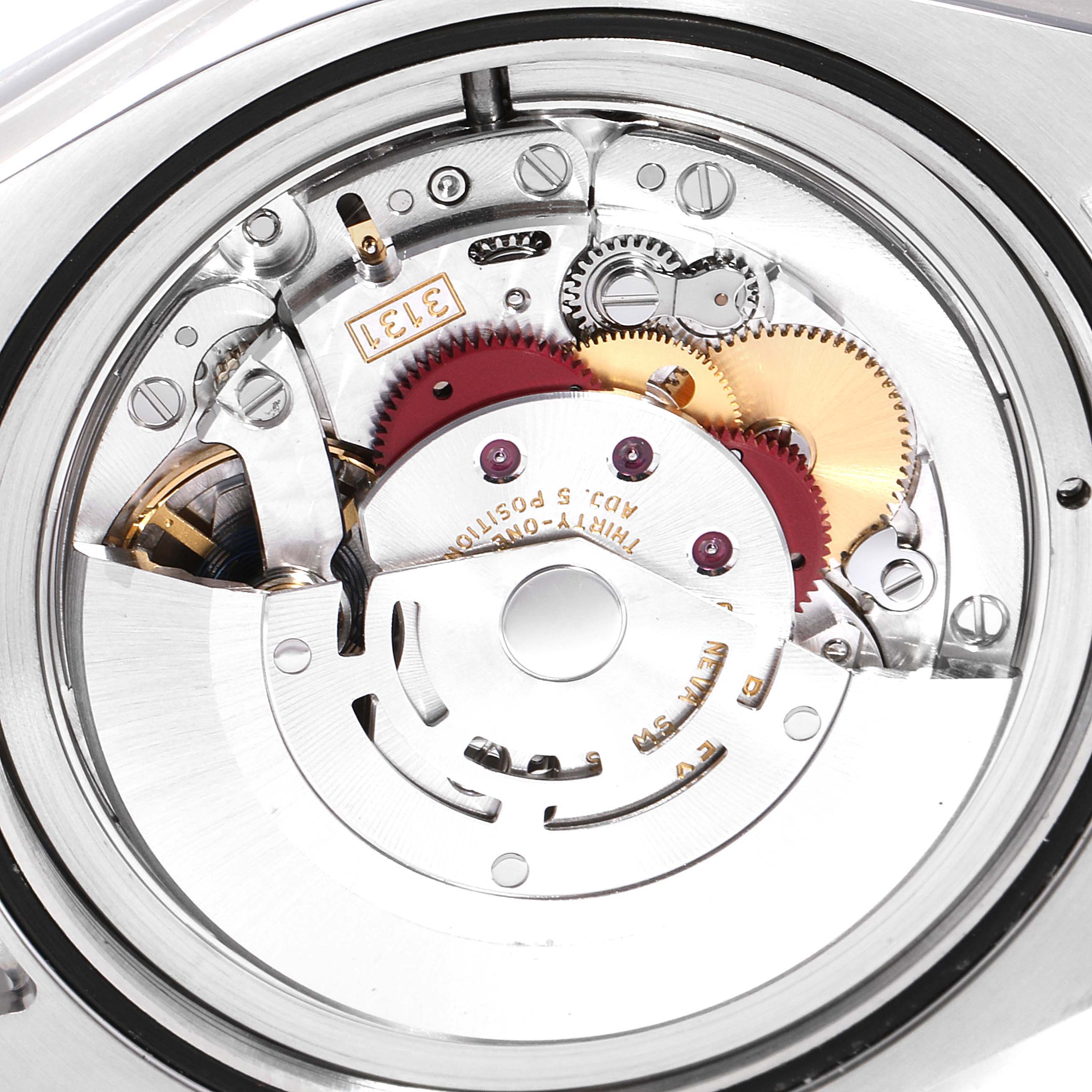 A close-up view of the movement and internal mechanism of the Rolex Milgauss 116400GV Men's Stainless Steel Black Dial 116400GV Men's Stainless Steel Black Dial watch is shown.