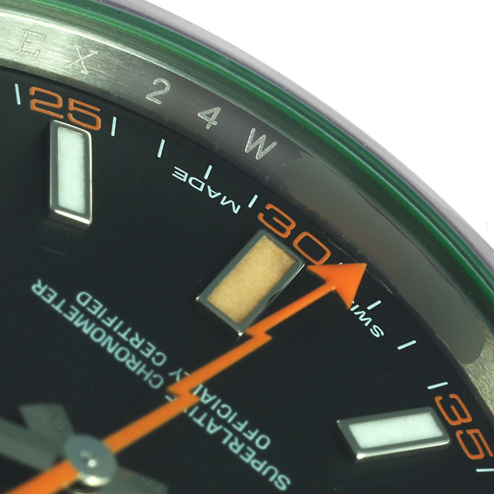 Close-up angle showing the dial, orange second hand, hour markers, and part of the outer bezel of the Rolex Milgauss 116400GV Men's Stainless Steel Black Dial 116400GV Men's Stainless Steel Black Dial watch.