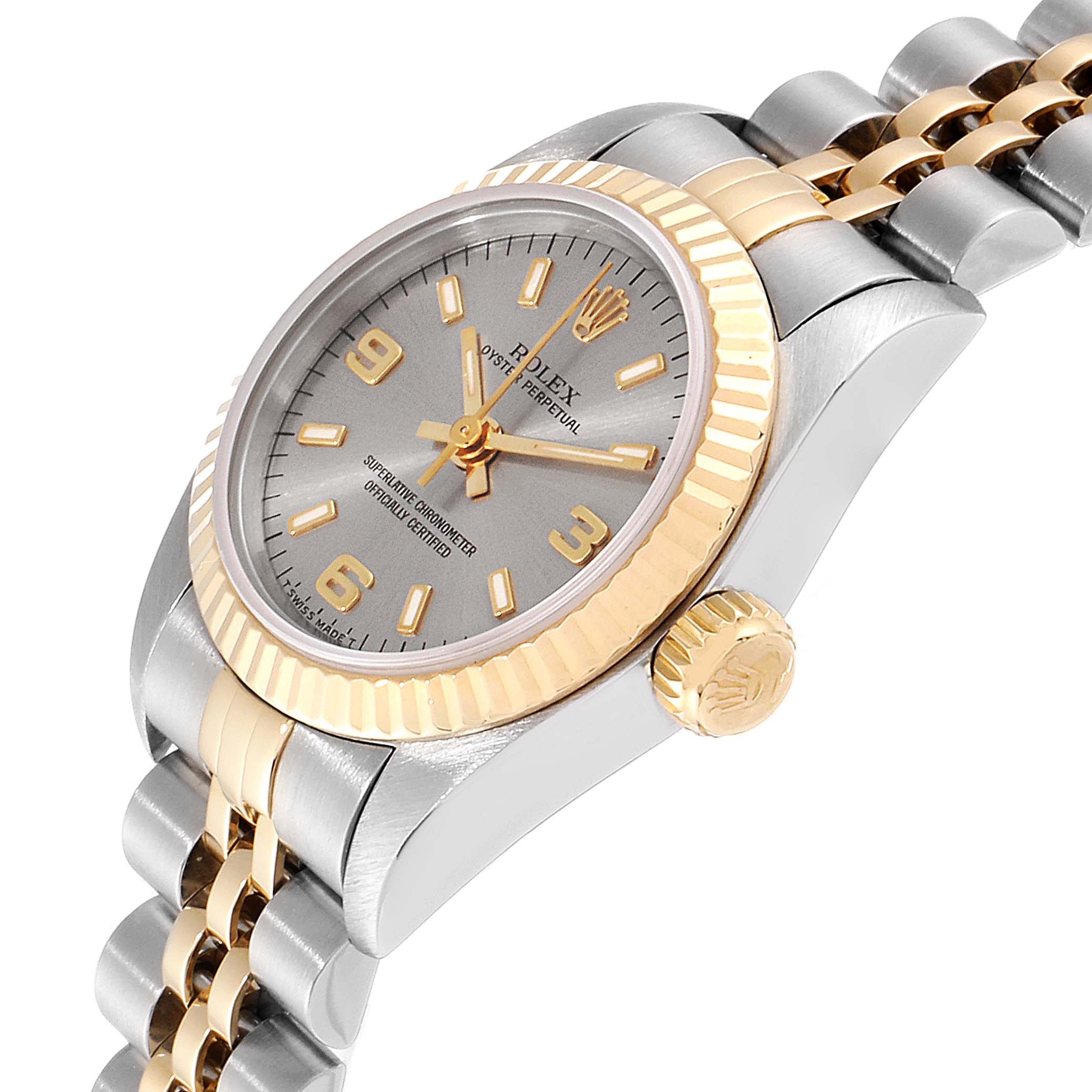 This image of a Rolex Oyster Perpetual 67193 Women's Steel and Gold (two tone) Grey Dial 67193 Women's Steel and Gold (two tone) Grey Dial watch displays the dial, crown, and bracelet from a slightly angled side view.