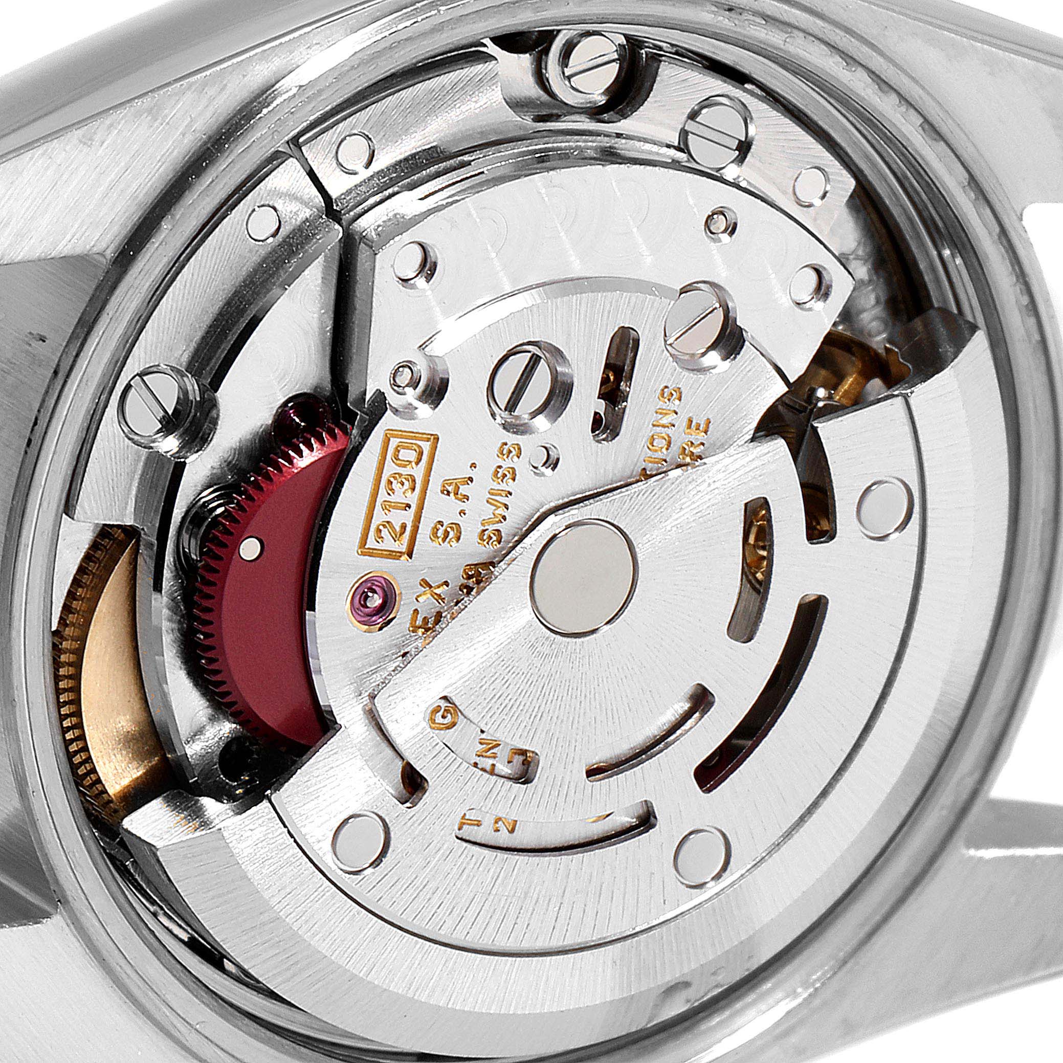 This image shows a close-up, detailed view of the internal movement mechanism of a Rolex Oyster Perpetual 67193 Women's Steel and Gold (two tone) Grey Dial 67193 Women's Steel and Gold (two tone) Grey Dial watch.