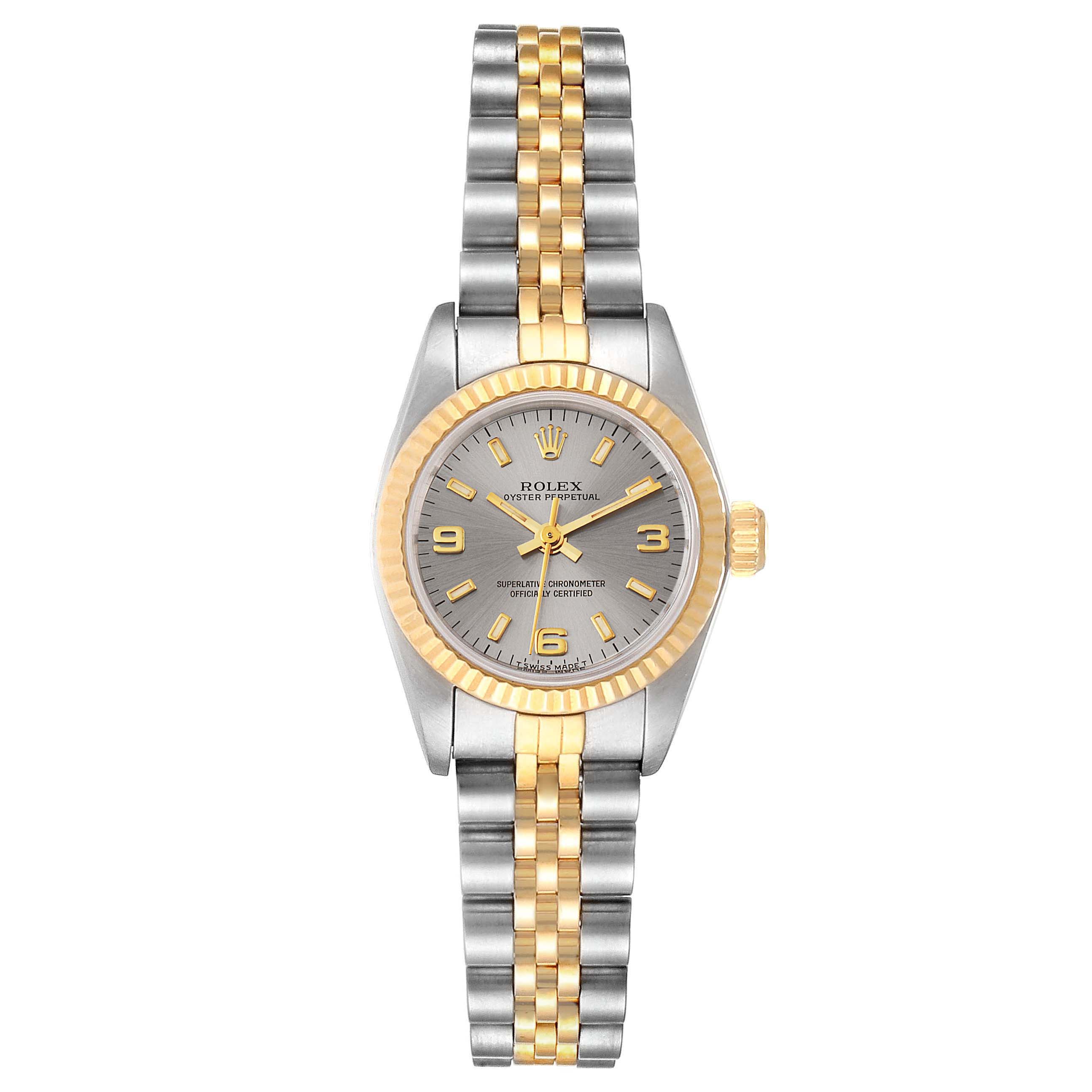 The image shows a front view of a Rolex Oyster Perpetual 67193 Women's Steel and Gold (two tone) Grey Dial 67193 Women's Steel and Gold (two tone) Grey Dial watch, featuring a silver and gold bezel and bracelet.