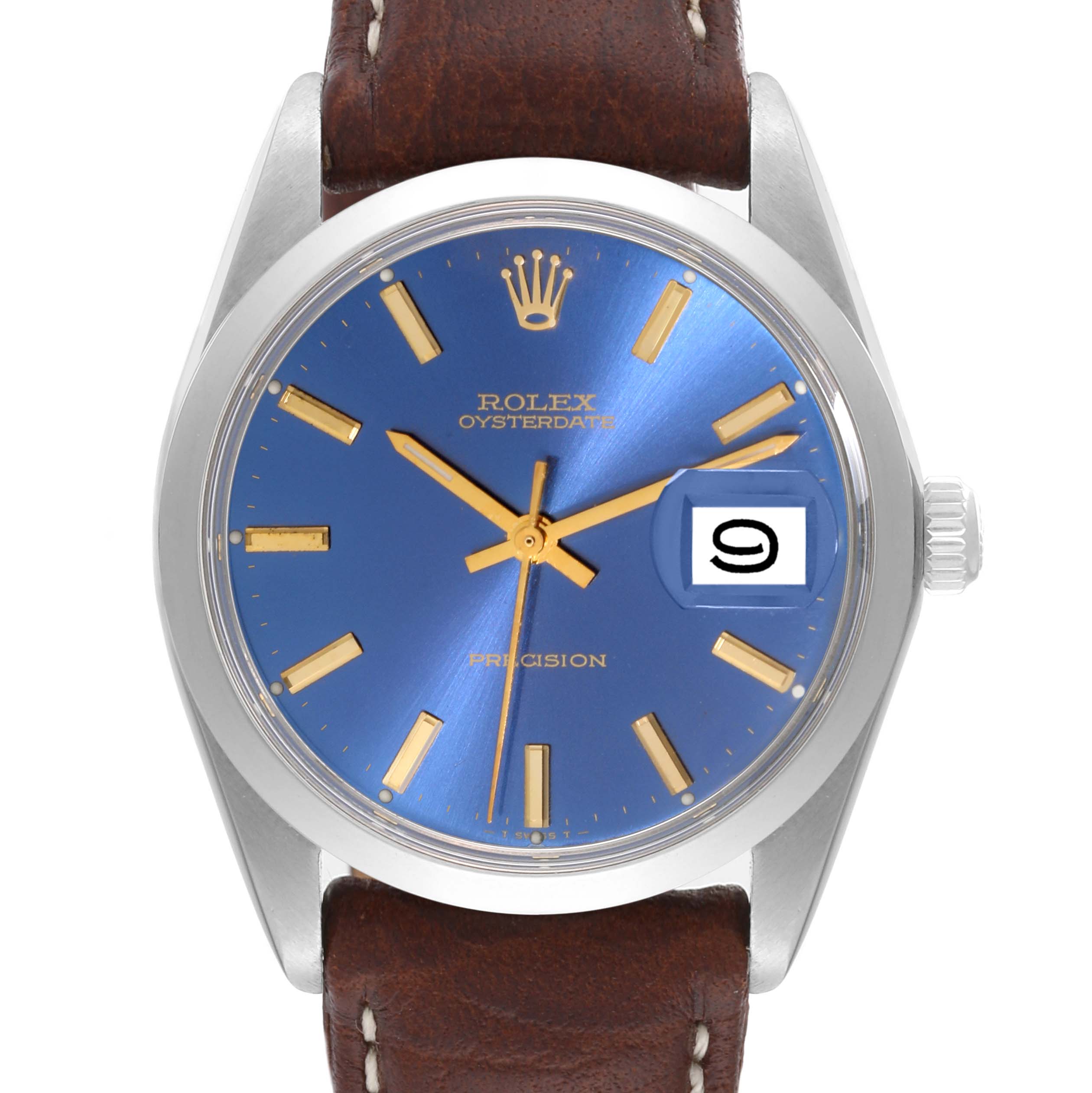 The image shows a frontal view of the Rolex Vintage Collection 6694 Men's Stainless Steel Blue Dial 6694 Men's Stainless Steel Blue Dial watch with a blue dial, gold markers, and a brown leather strap.