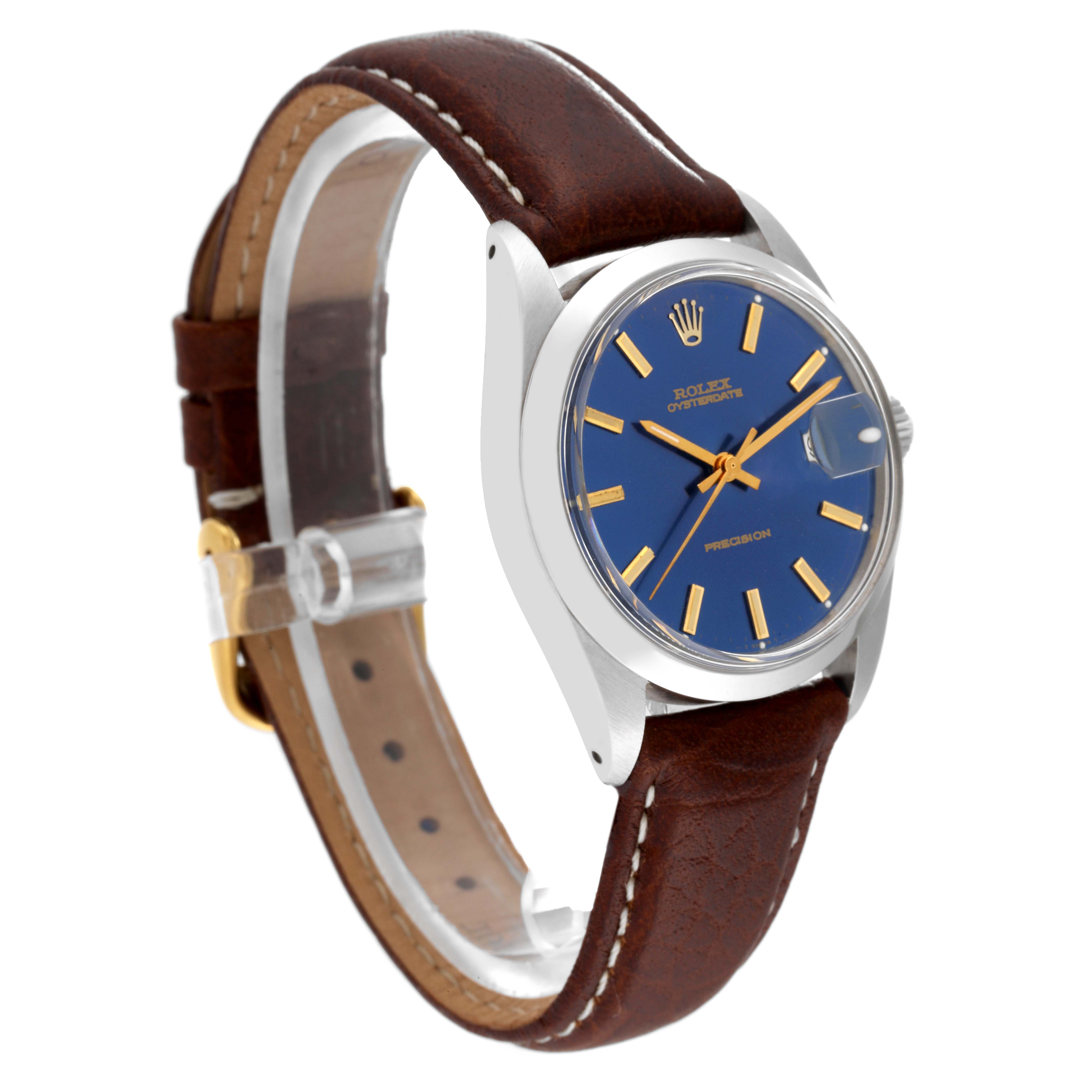 The image shows a Rolex Vintage Collection 6694 Men's Stainless Steel Blue Dial 6694 Men's Stainless Steel Blue Dial watch with a blue dial, gold indices, and a brown leather strap, viewed from a front-right angle.