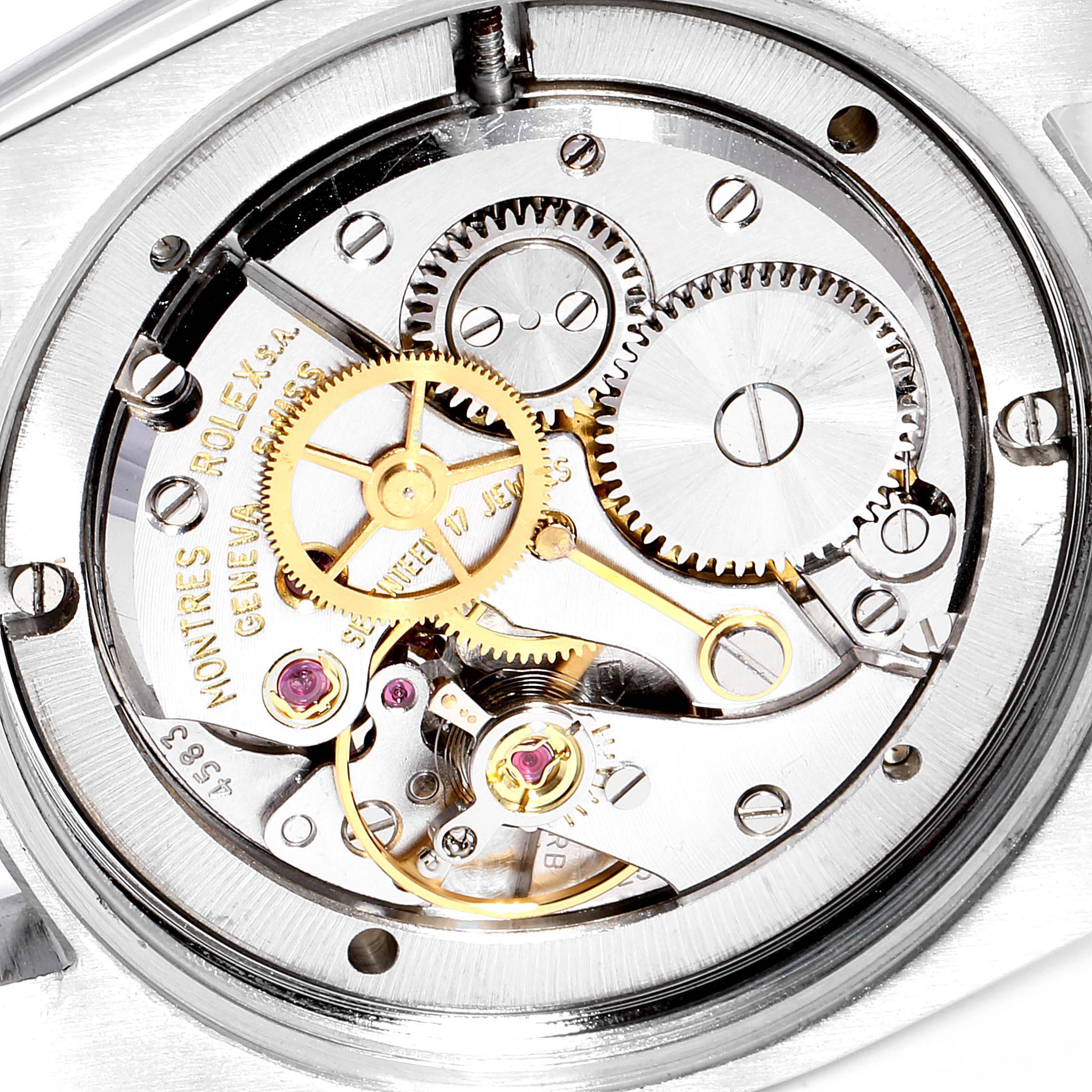 This image shows the internal mechanical movement of a Vintage Collection Rolex watch viewed from the back.