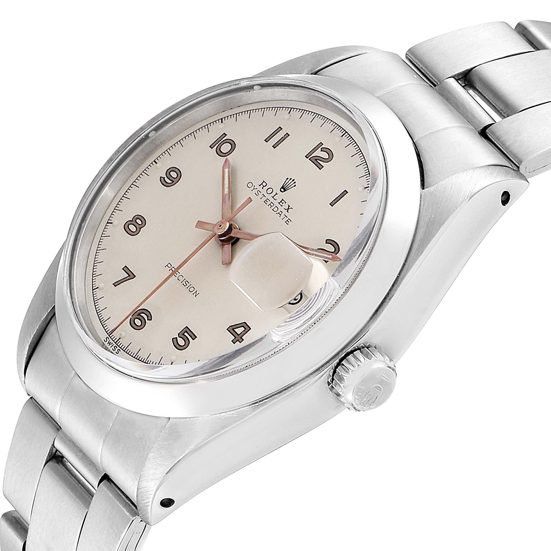 The image shows a side and front angle of the Rolex Vintage Collection 6694 Men's Stainless Steel Silver Dial 6694 Men's Stainless Steel Silver Dial watch, highlighting the casing, dial, magnified date, and bracelet.