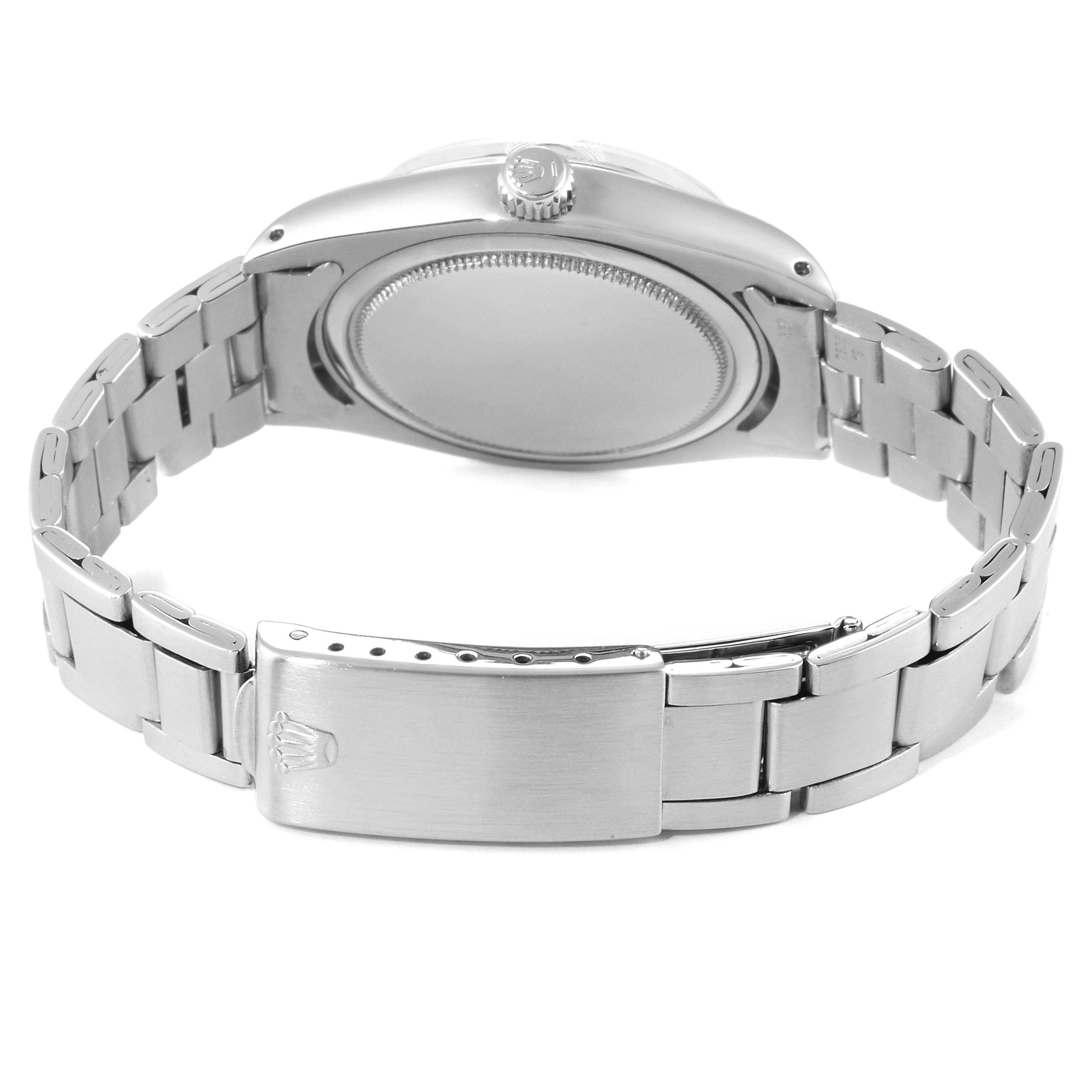 The image showcases the back and side view of the Rolex Vintage Collection 6694 Men's Stainless Steel Silver Dial 6694 Men's Stainless Steel Silver Dial watch, highlighting the bracelet, clasp, and case back.