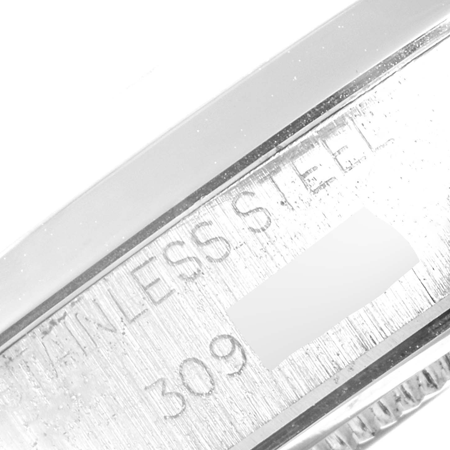 This close-up image shows a portion of the stainless steel band of a Rolex Vintage Collection 6694 Men's Stainless Steel Silver Dial 6694 Men's Stainless Steel Silver Dial watch.