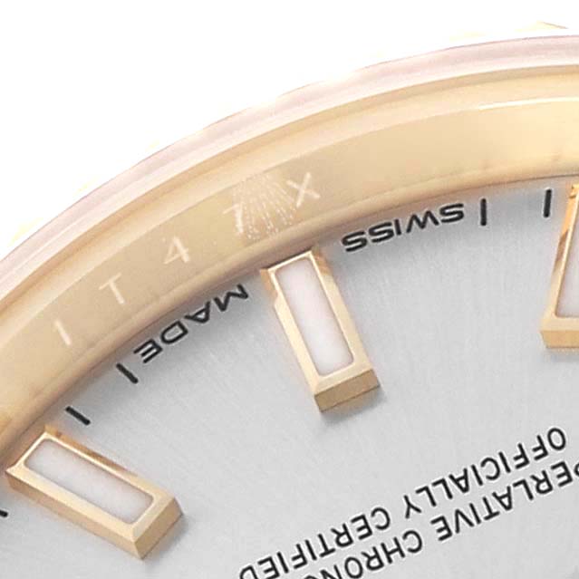 The image shows a close-up of the dial
s edge and indices of the Rolex President 279178 Women
s Yellow Gold Silver Dial model watch, viewed from a side angle.