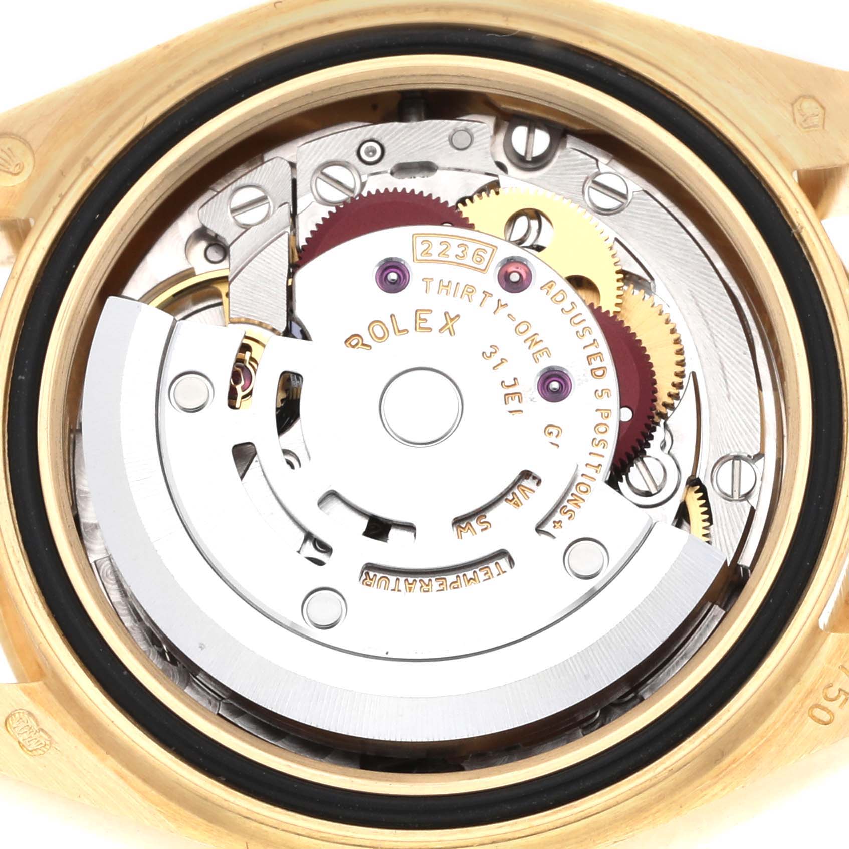 The image shows the internal mechanism of a Rolex President 279178 Women
s Yellow Gold Silver Dial watch, focusing on the rotor and balance wheel.