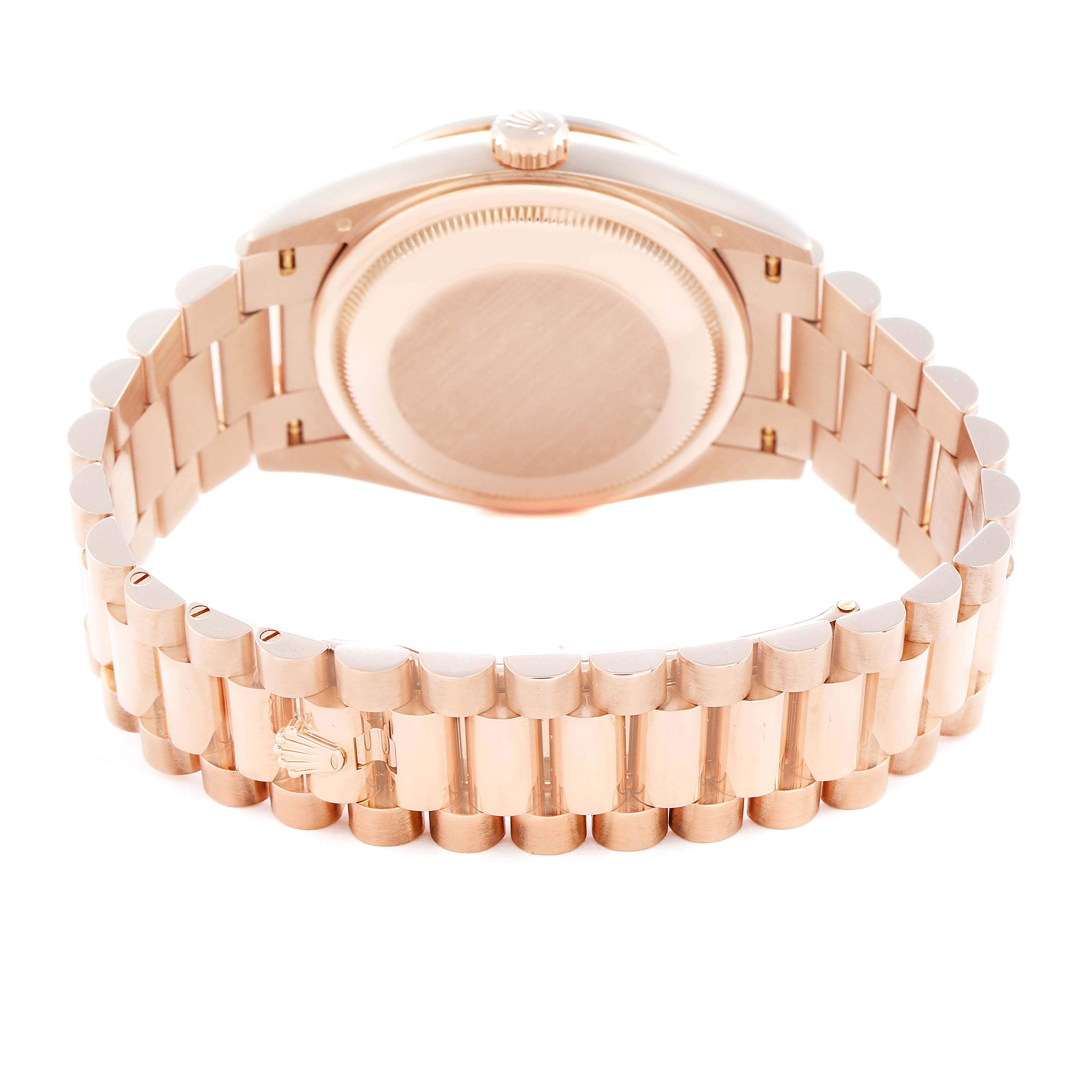 The image shows the back and bracelet of a Rolex President 128345 Men
s Rose Gold Brown Dial model watch, highlighting its clasp and case back.