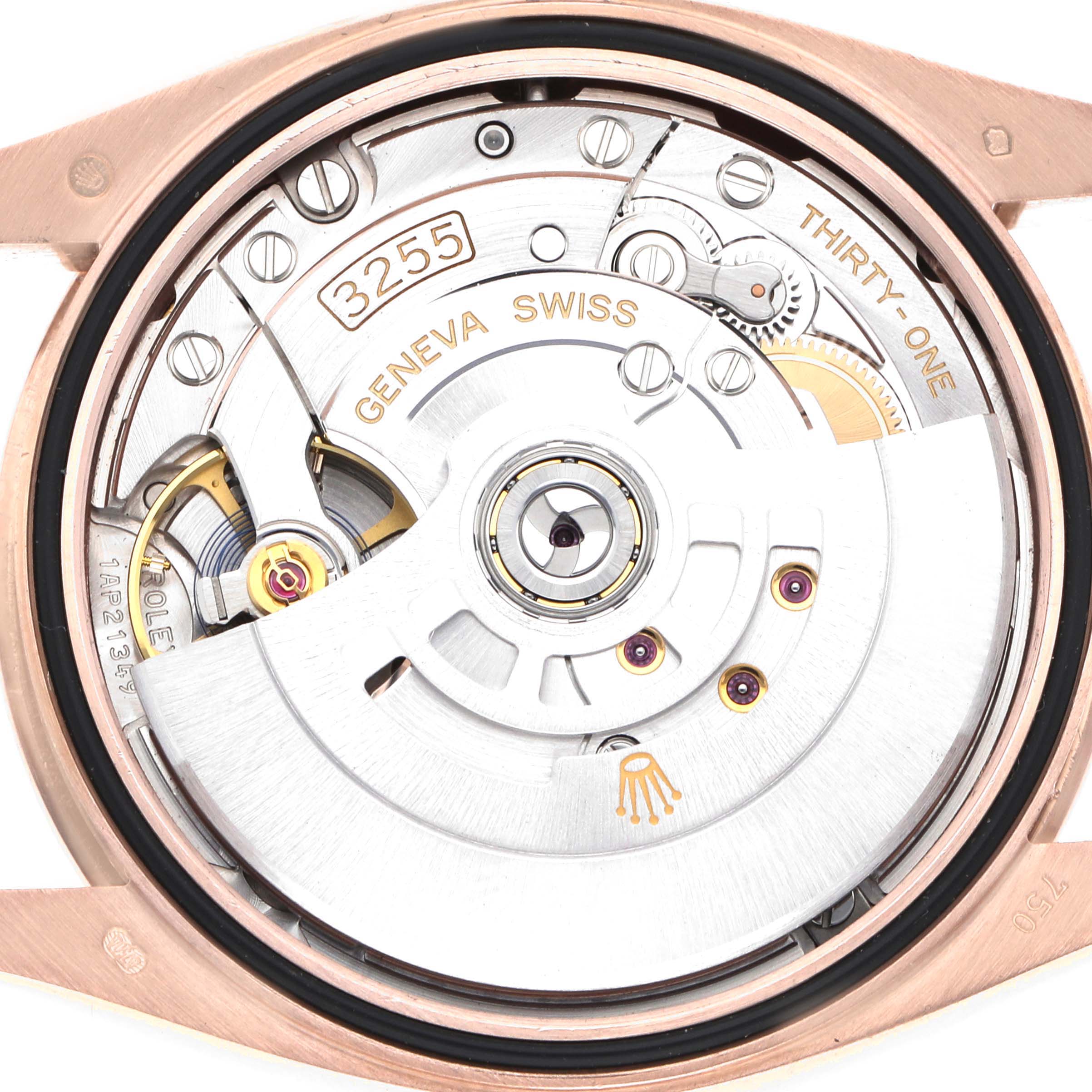 The image shows the movement of a Rolex President 128345 Men
s Rose Gold Brown Dial, model 3255, from a top-down angle, highlighting the intricate inner mechanics.