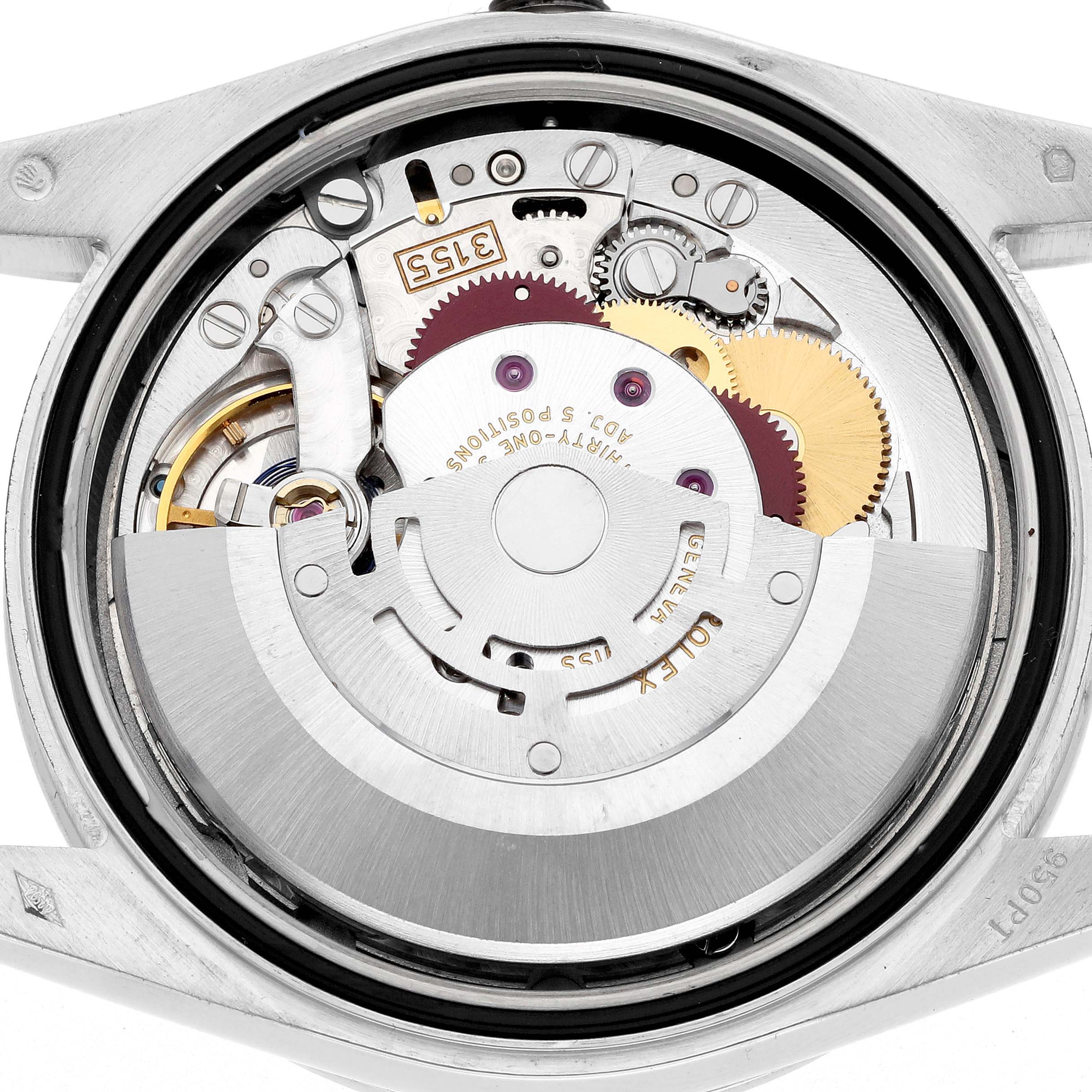The image shows the exposed movement of a Rolex President 118346 Men
s Platinum Silver Dial, highlighting gears and the oscillating weight from a back view.