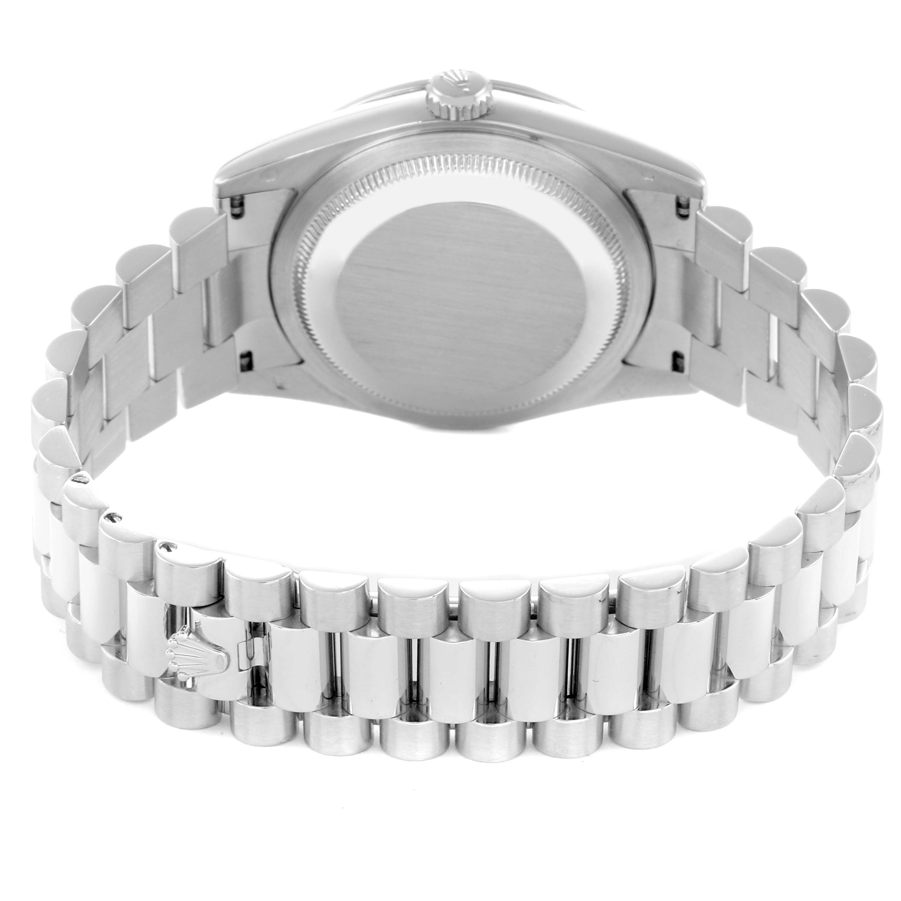 The image shows the back casing and bracelet of a Rolex President 118346 Men
s Platinum Silver Dial model watch from a rear angle.