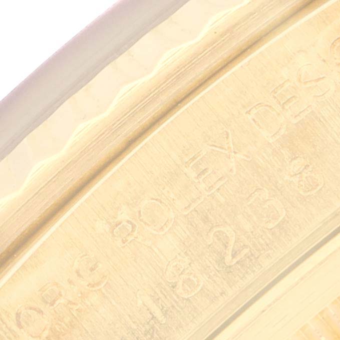 This image is a close-up of the inner engraving on the case back of a Rolex President 18238 Men's Yellow Gold Champagne Dial 18238 Men's Yellow Gold Champagne Dial model watch.