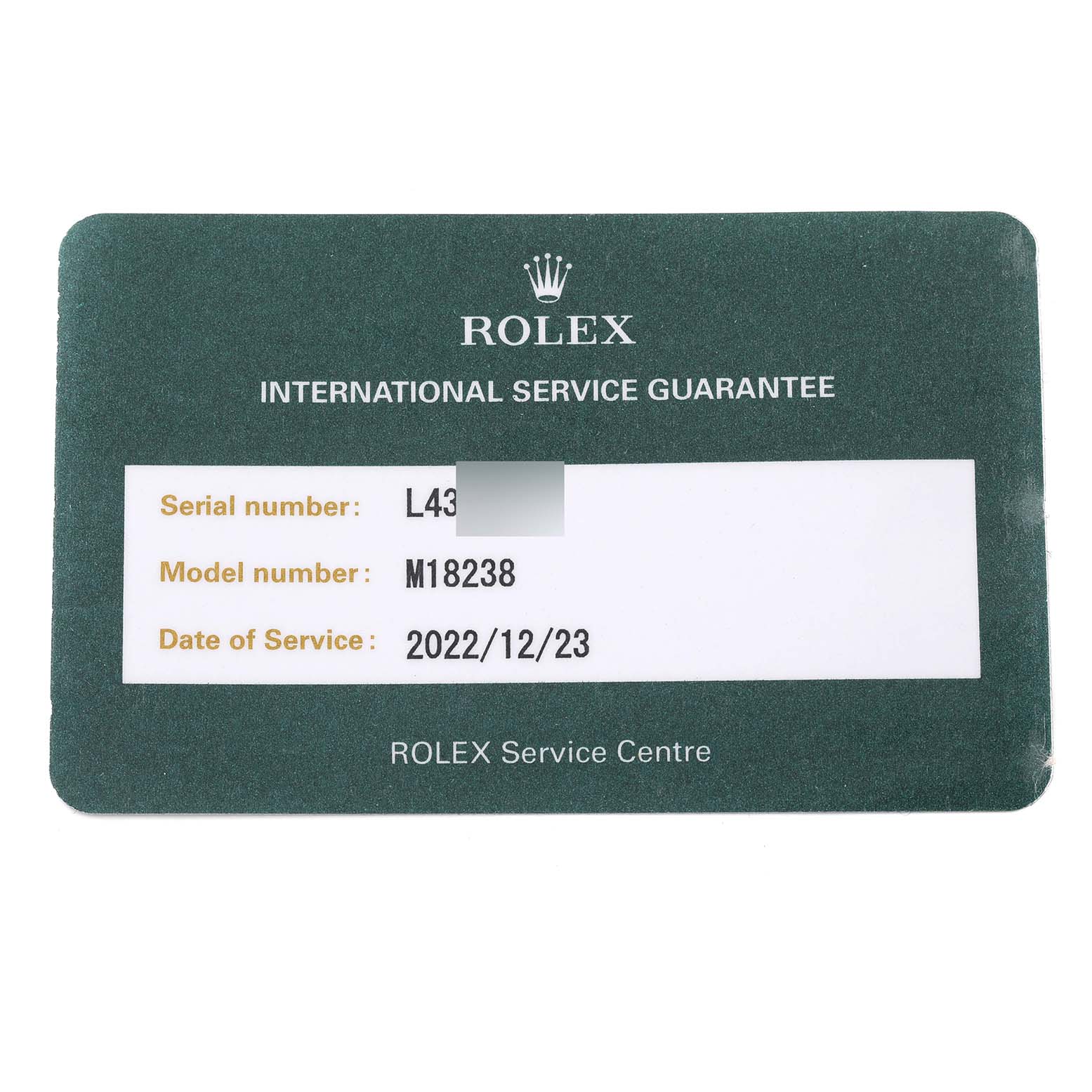This image shows a Rolex International Service Guarantee card for a Rolex President 18238 Men's Yellow Gold Champagne Dial 18238 Men's Yellow Gold Champagne Dial model, M18238.