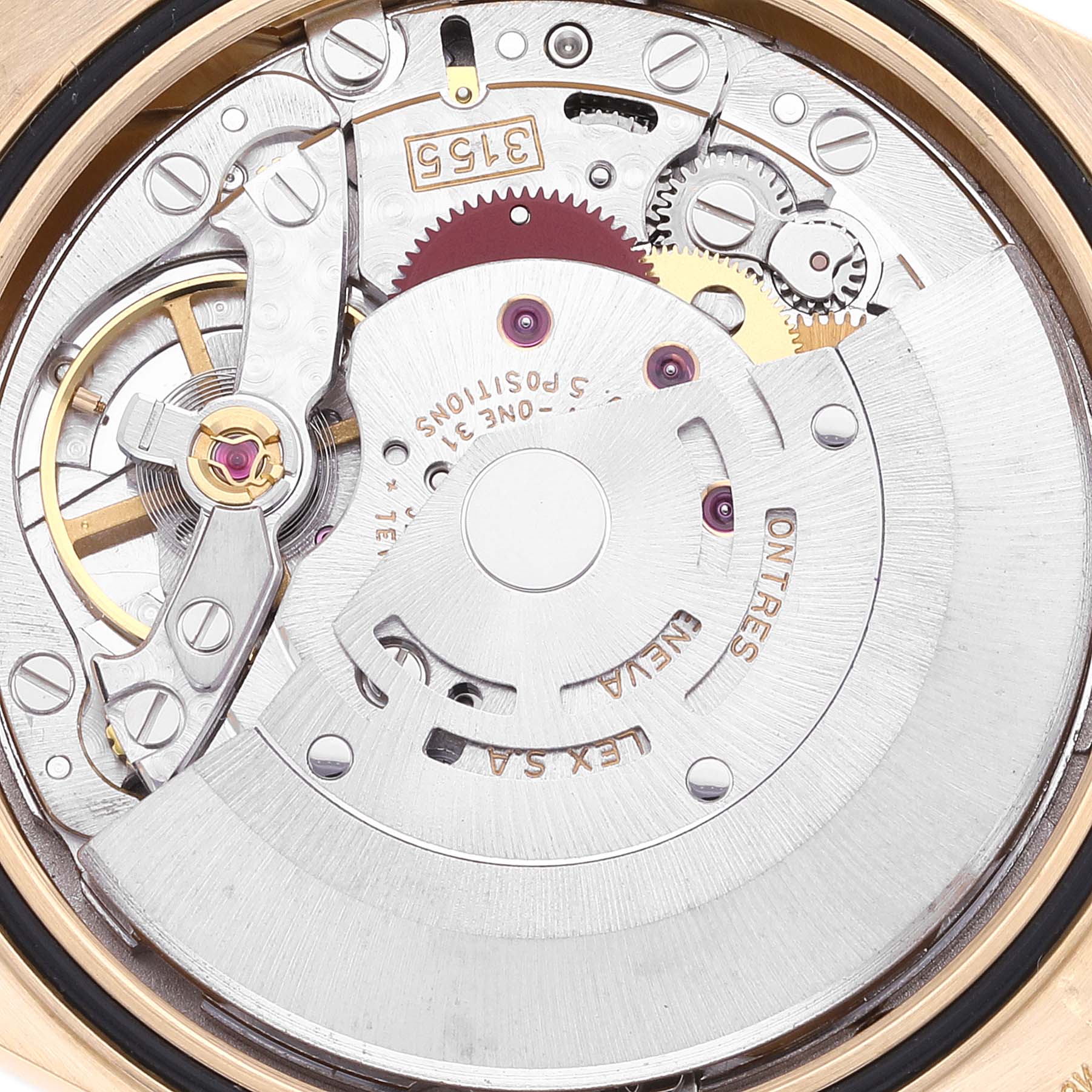 This close-up image shows the intricate mechanical movement of a Rolex President 18238 Men's Yellow Gold Champagne Dial 18238 Men's Yellow Gold Champagne Dial model watch.