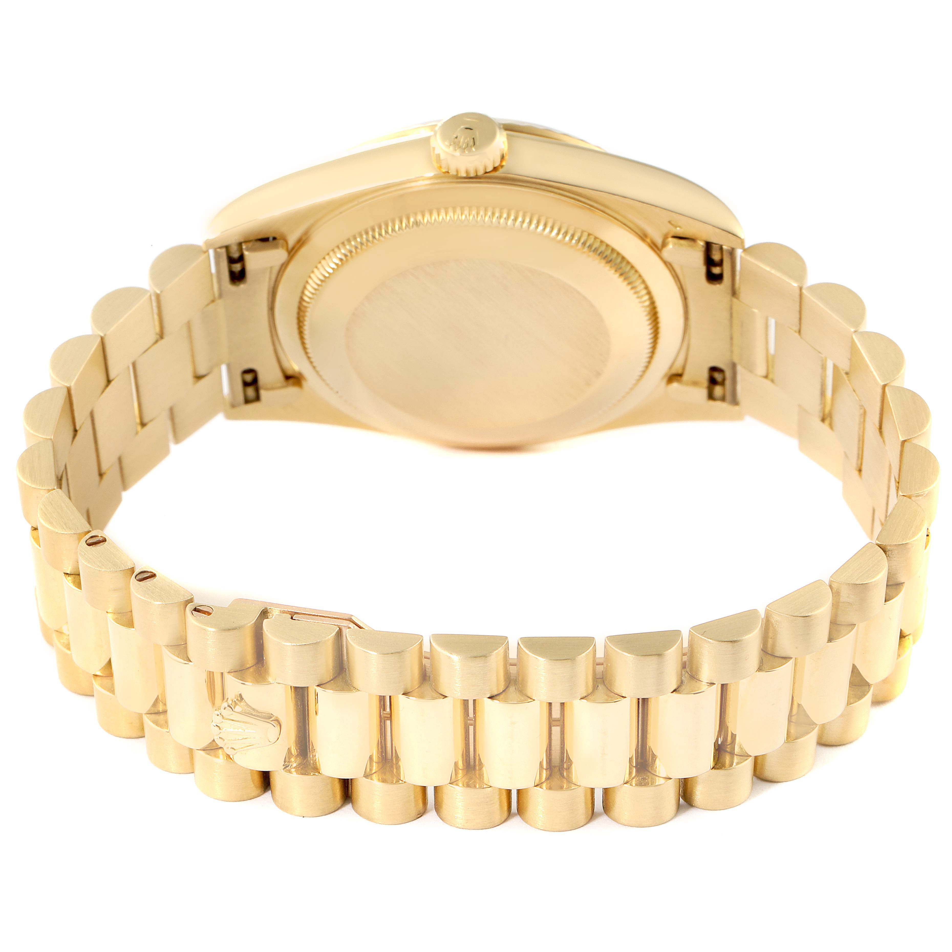 The image shows the back case and bracelet of a Rolex President 18238 Men
s Yellow Gold Champagne Dial model watch from a rear angle.