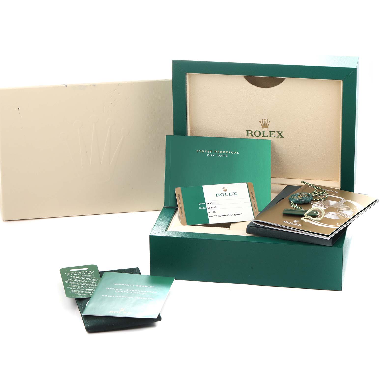 The image shows the packaging and documentation for a Rolex President 118238 Men
s Yellow Gold White Dial model, including the box, booklet, and warranty cards.