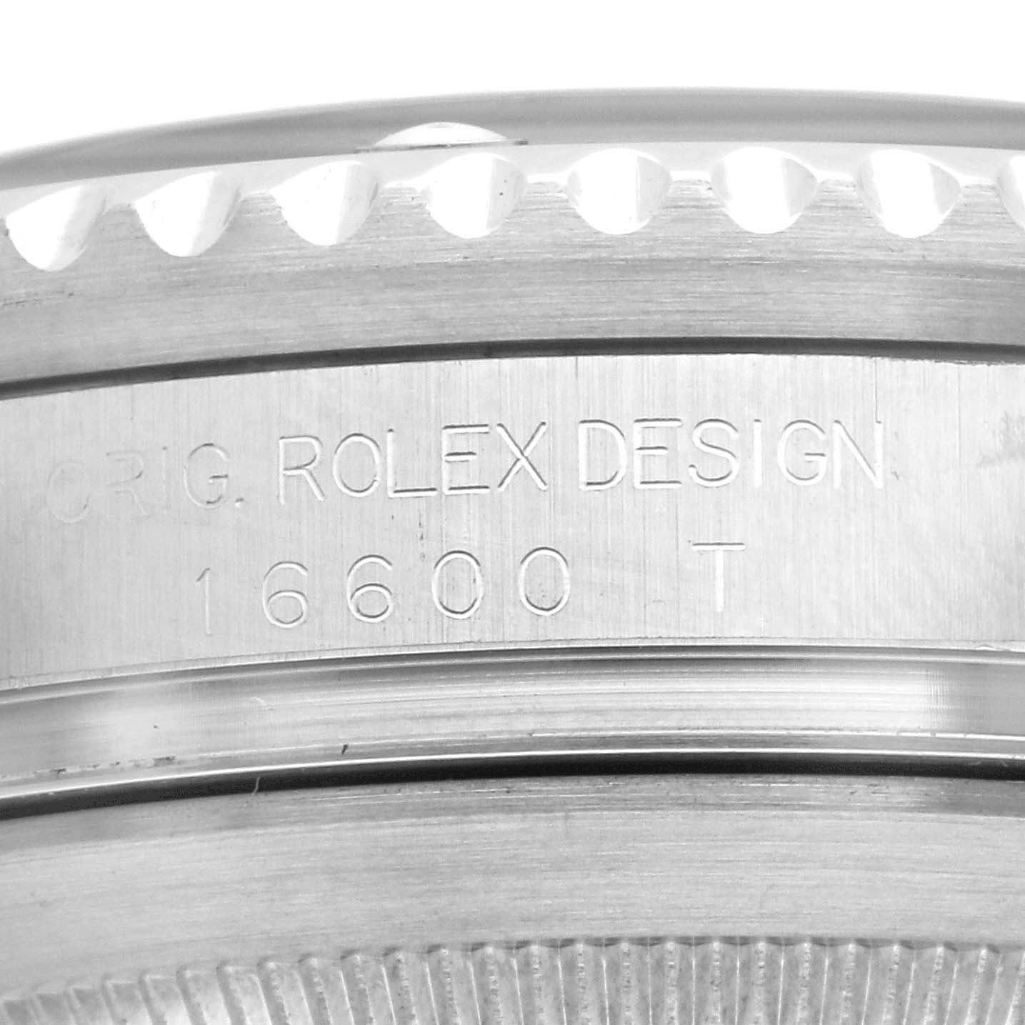 This image shows a close-up of the side of a Rolex Sea-Dweller 16600 Men
s Stainless Steel Black Dial 16600 Men
s Stainless Steel Black Dial 16600 model, focusing on the engraved text.