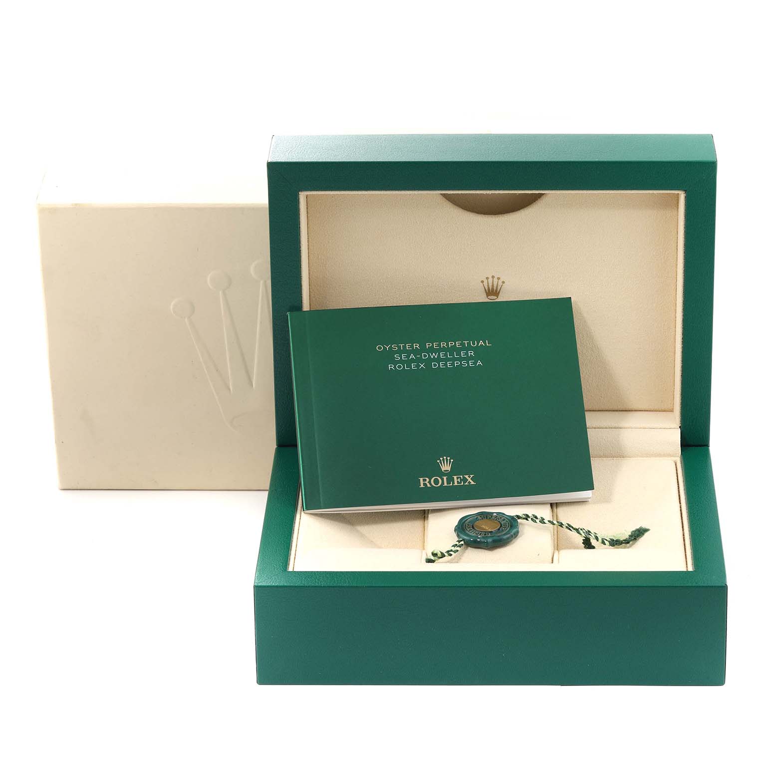 This image shows the packaging box, manual, and accessory tag for the Rolex Sea-Dweller 126660 Men
s Stainless Steel Black Dial 126660 Men
s Stainless Steel Black Dial watch, viewed from the front.