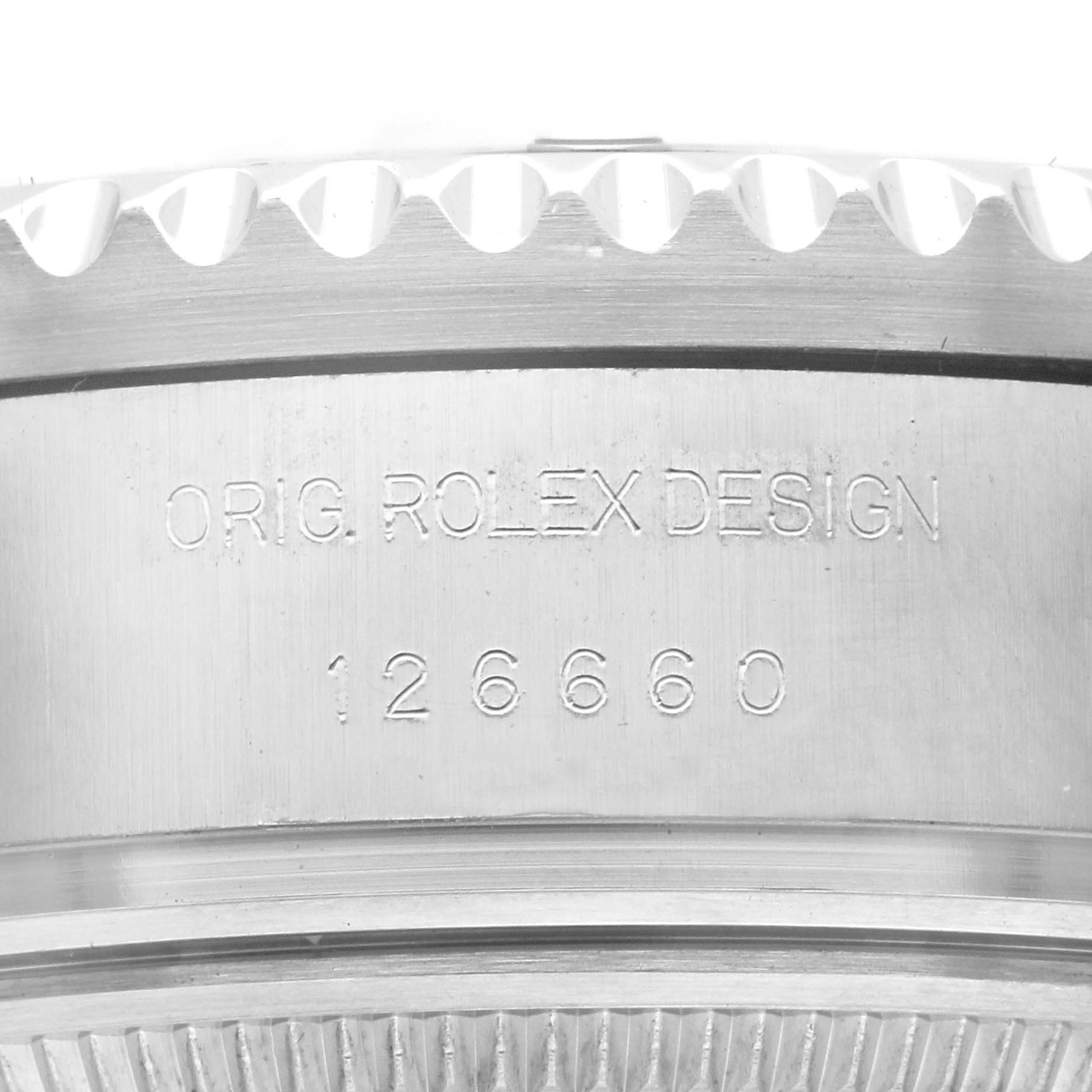 This image shows a close-up of the case side and engraved serial number of a Rolex Sea-Dweller 126660 Men
s Stainless Steel Black Dial 126660 Men
s Stainless Steel Black Dial watch.