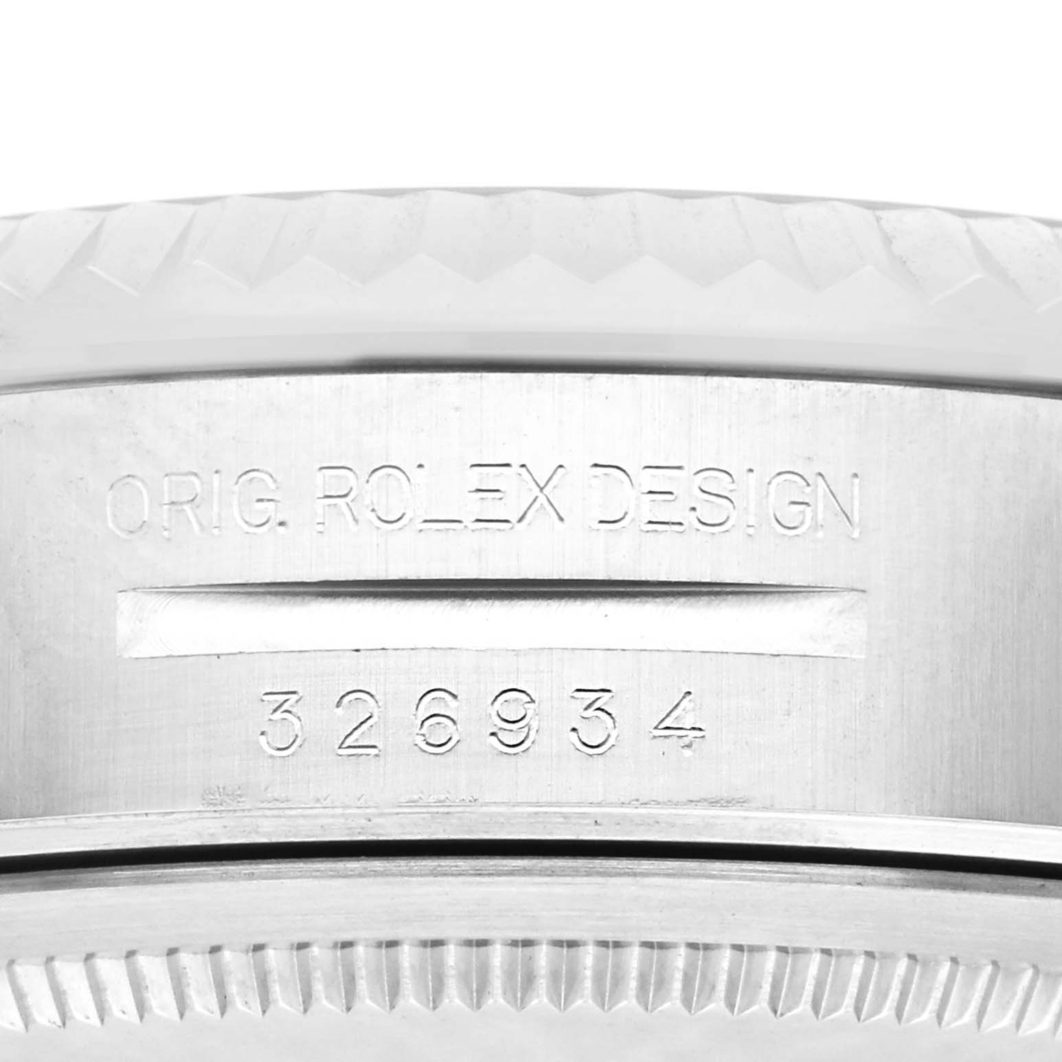 The image shows an engraved side view of the bezel and edge of the case, detailing "ORIG. ROLEX DESIGN" on the Rolex Sky-Dweller 326934 Men
s Stainless Steel Blue Dial.