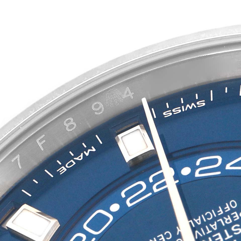 The image shows a close-up of the dial and bezel of the Rolex Sky-Dweller 326934 Men
s Stainless Steel Blue Dial, focusing on the numbering and markings.
