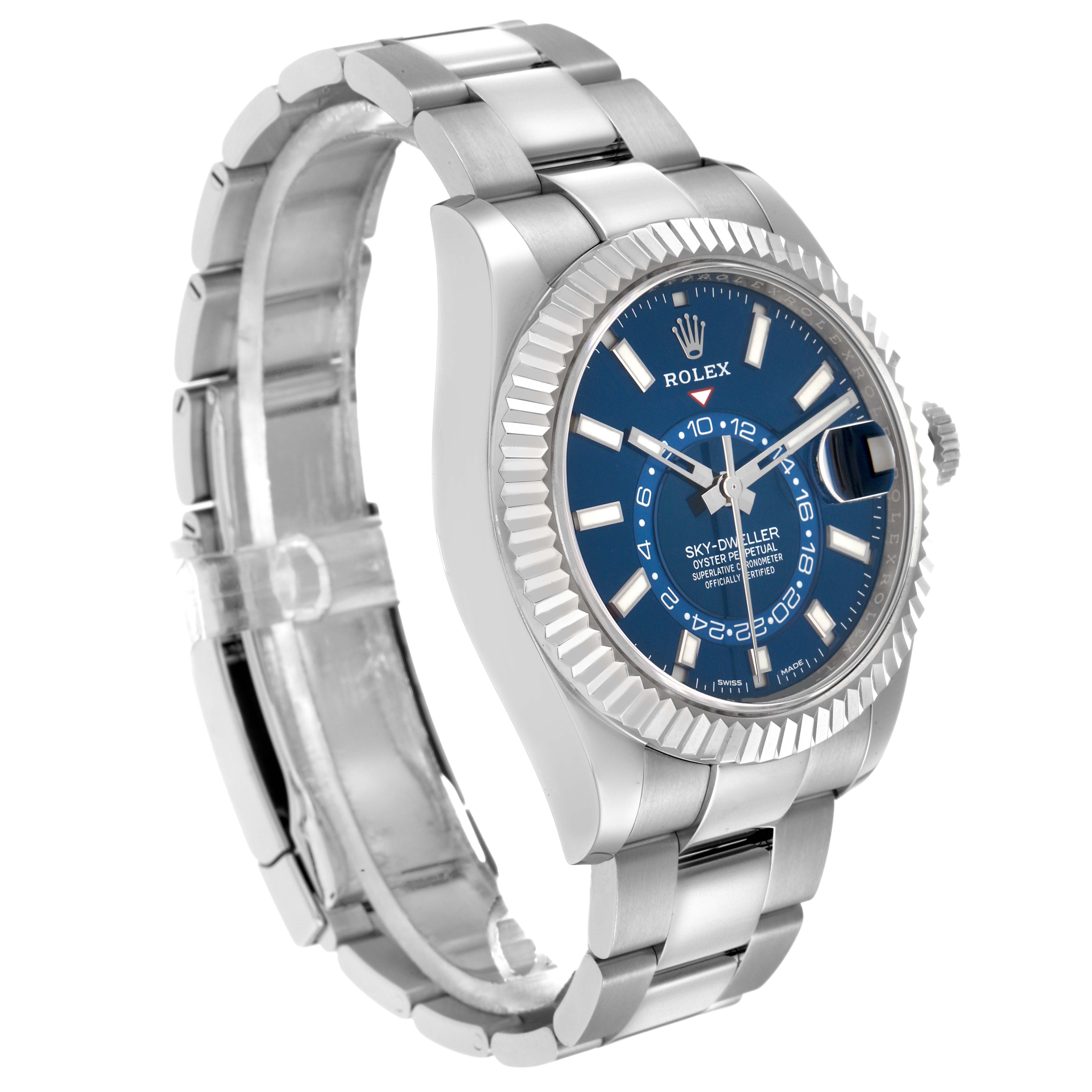 The Rolex Sky-Dweller 326934 Men
s Stainless Steel Blue Dial watch is shown at an angled side view, displaying the face, bezel, and part of the bracelet.