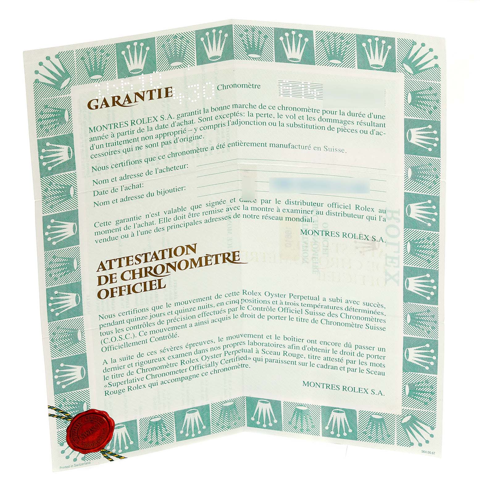 The image shows the green Rolex warranty and chronometer certification document, folded open.