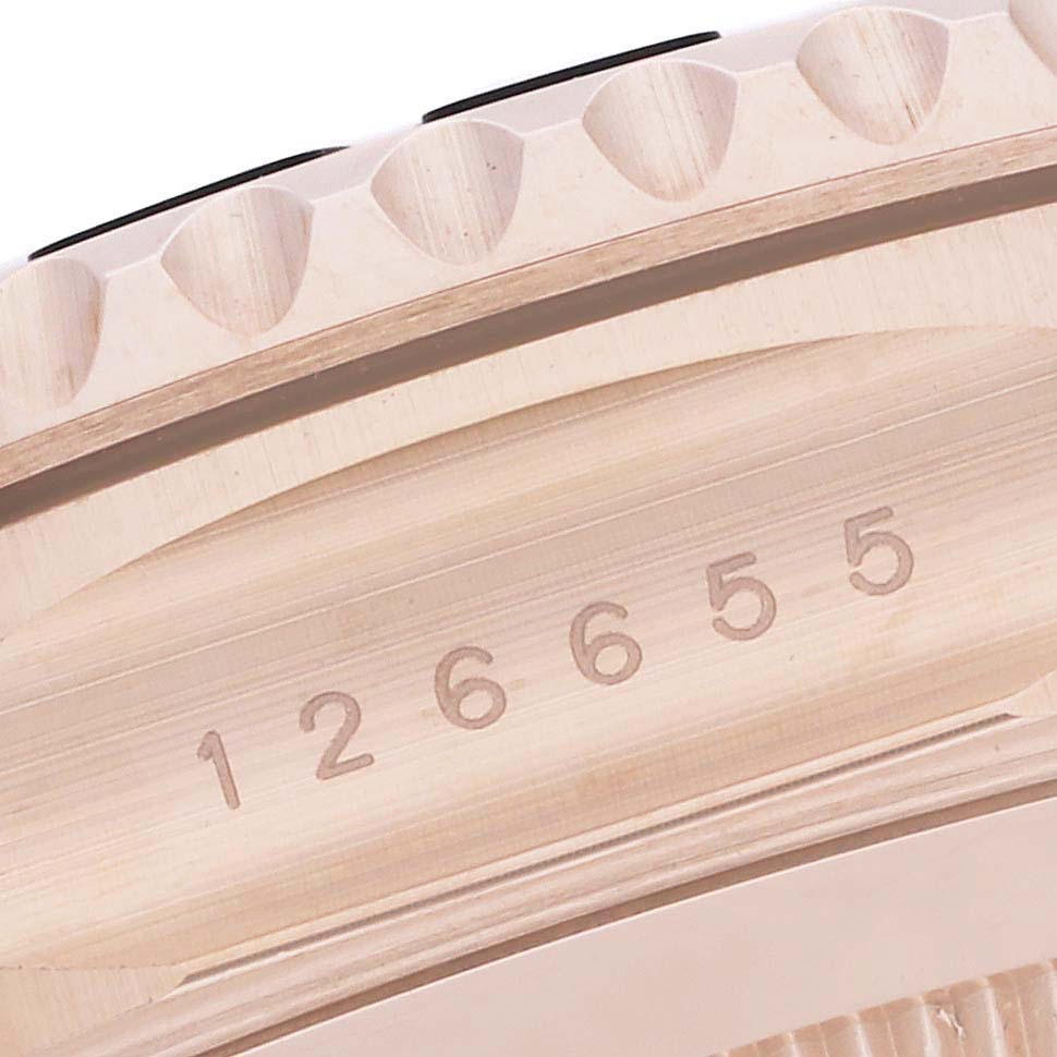This image shows a close-up of the bezel and case edge, including the model number, of a Rolex Yacht-Master 126655 Men's Rose Gold Black Dial 126655 Men's Rose Gold Black Dial watch.