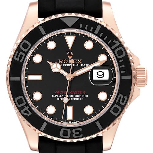 The image shows a front view of a Rolex Yacht-Master watch, highlighting the black dial, bezel, crown, and date window.