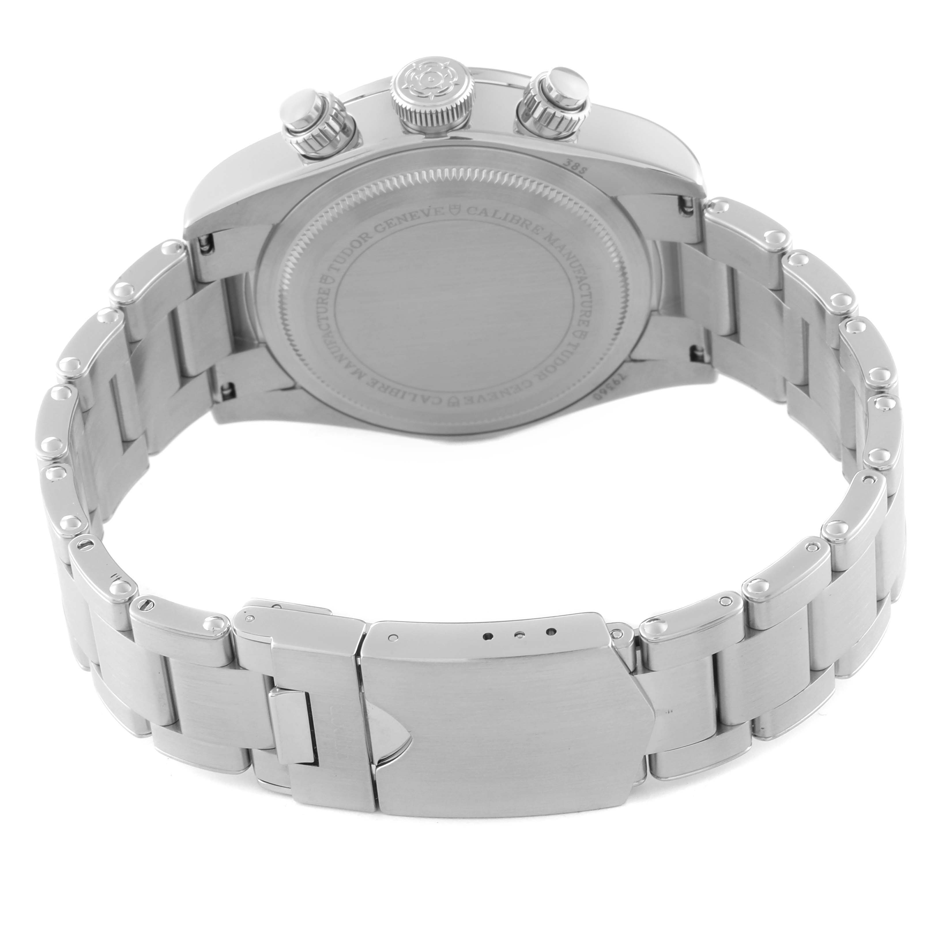 The image shows the back view of a Tudor Heritage Black Bay 79360N-002 Men's Stainless Steel White Dial 79360N-002 Men's Stainless Steel White Dial watch, highlighting its stainless steel case back and bracelet with a clasp.