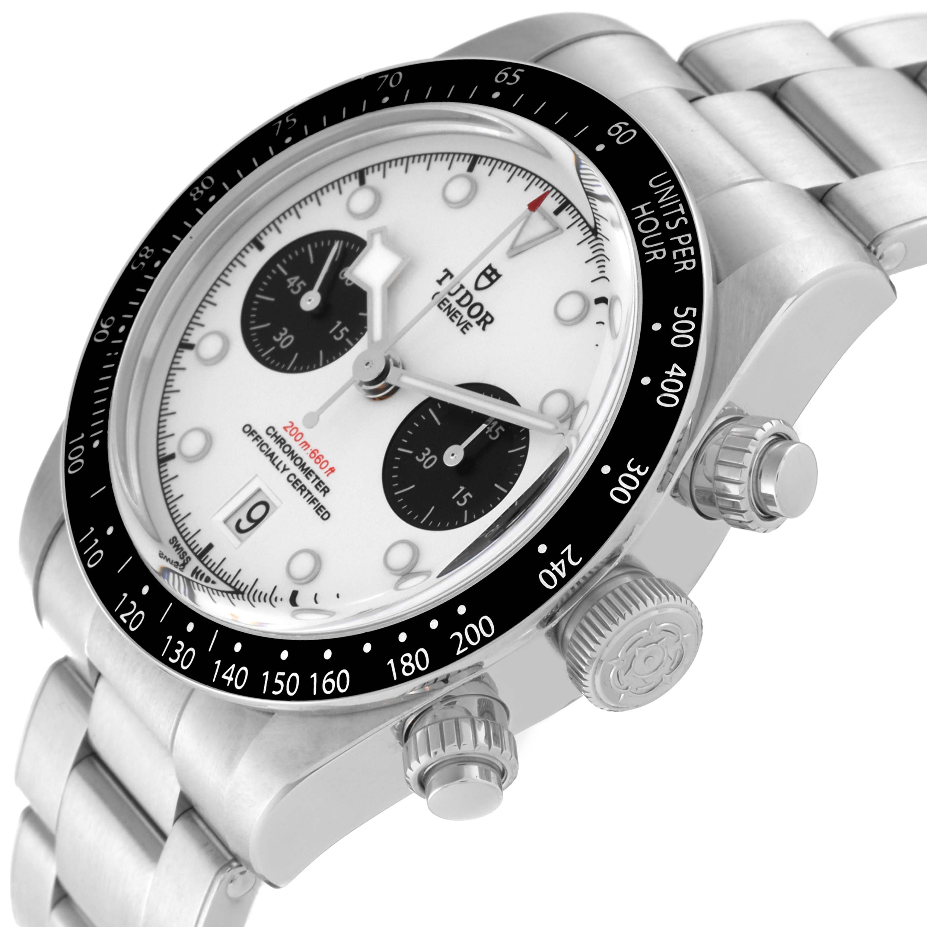 The Tudor Heritage Black Bay 79360N-002 Men's Stainless Steel White Dial 79360N-002 Men's Stainless Steel White Dial watch is shown at a close-up angle, highlighting its dial, bezel, crown, and part of the bracelet.