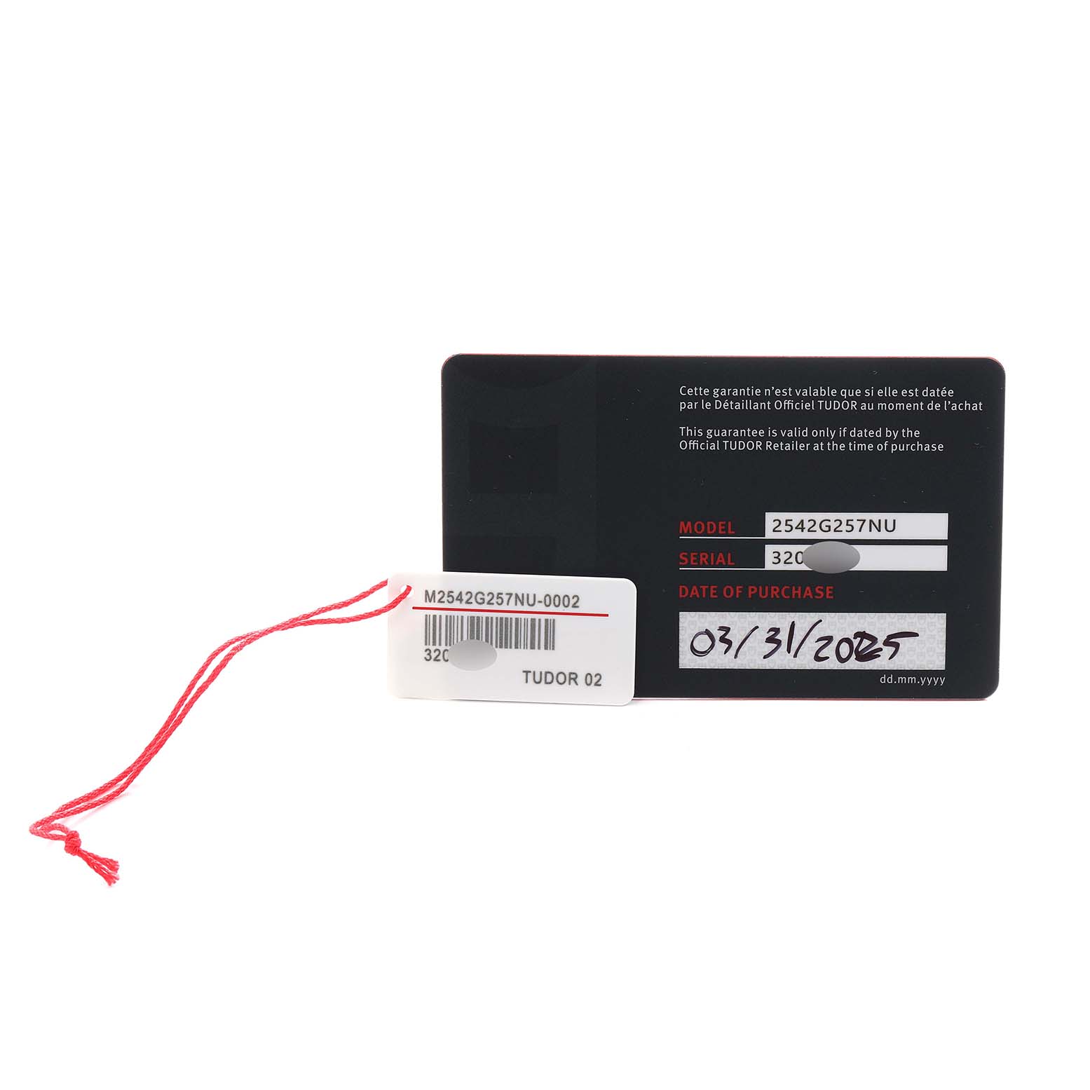 The image shows a warranty card for a Tudor Pelagos M2542G257NU Men
s Titanium Black Dial watch with model and serial numbers, and a tag attached.