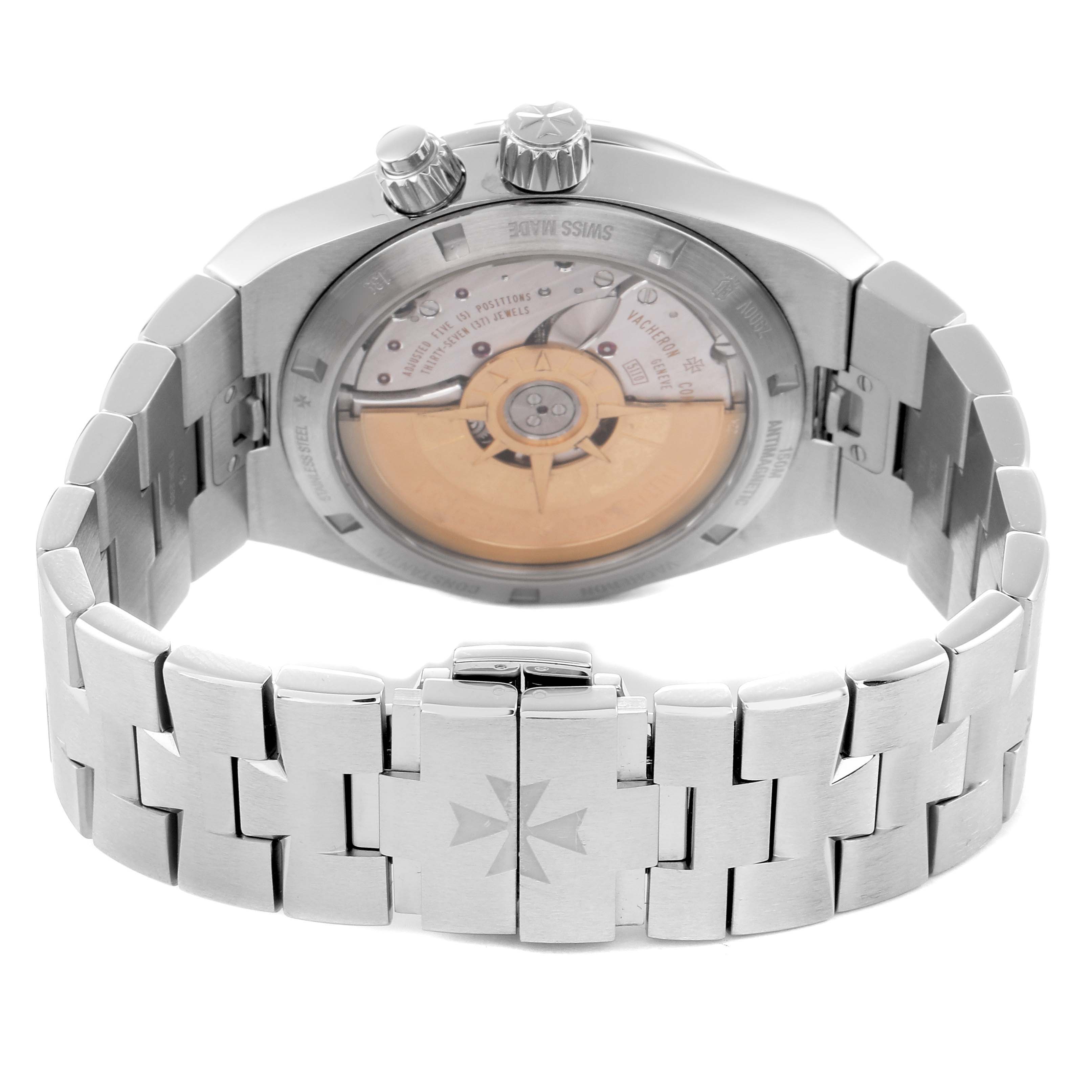 The Vacheron Constantin Overseas 7900V Men
s Stainless Steel Silver Dial watch is shown from a rear angle, highlighting the transparent case back and bracelet.