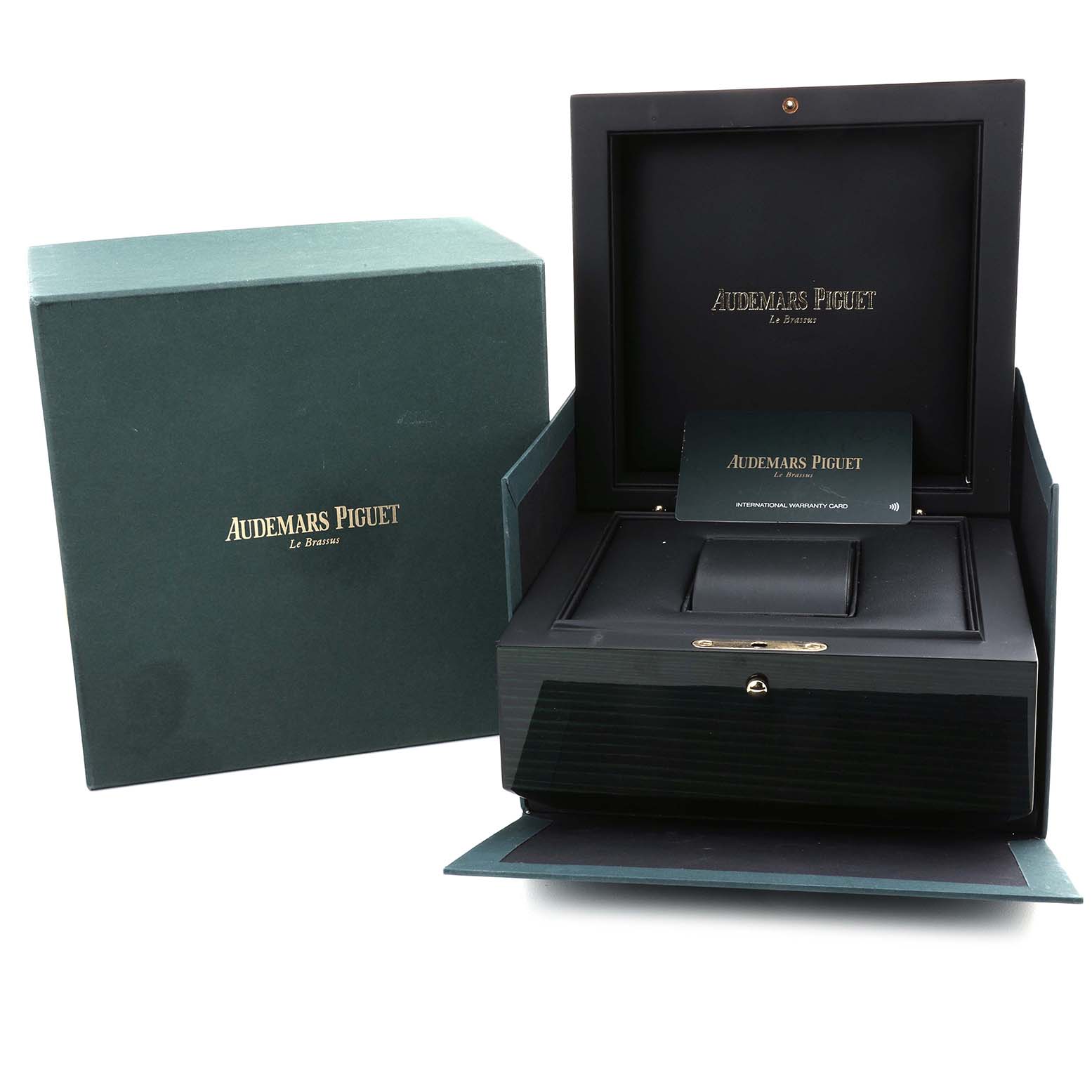 The image shows the open packaging of an Audemars Piguet Royal Oak Offshore 15720ST.OO.A027CA.01 Men's Stainless Steel Blue Dial, including a watch box and warranty card.