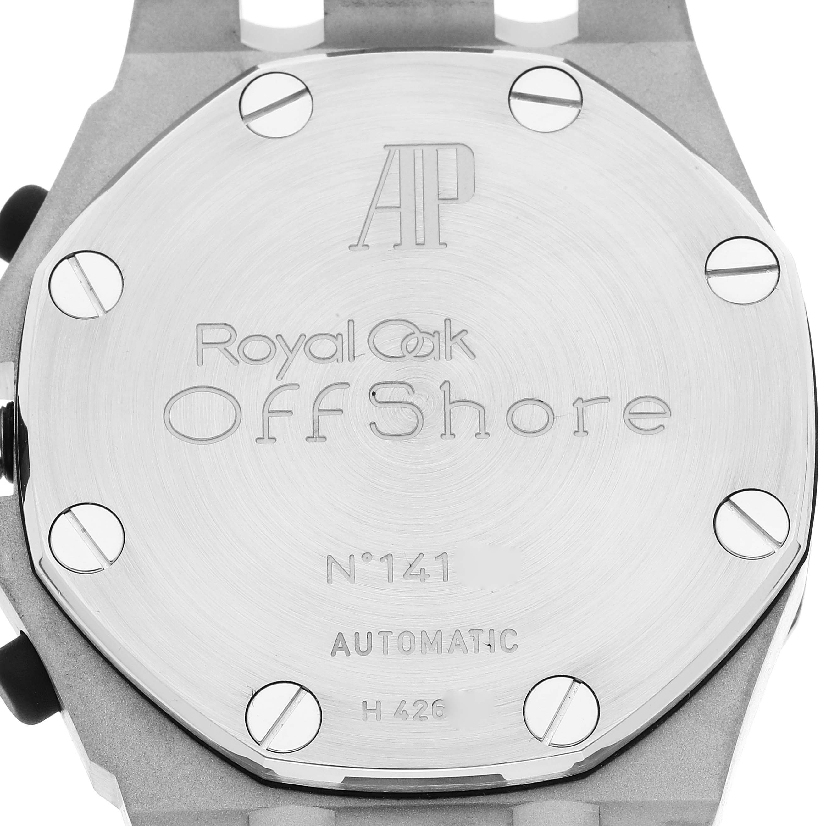 The image shows the back case of an Audemars Piguet Royal Oak Offshore 26170ST.OO.D091CR.01 Men's Stainless Steel Silver Dial 26170ST.OO.D091CR.01 Men's Stainless Steel Silver Dial watch, highlighting its engraved details and screws.