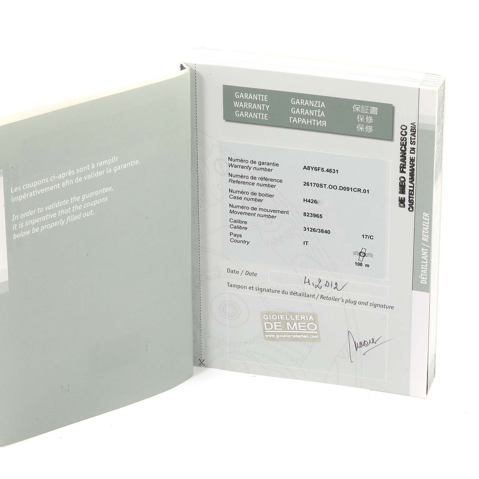 The image shows the warranty card and documentation for the Audemars Piguet Royal Oak Offshore 26170ST.OO.D091CR.01 Men's Stainless Steel Silver Dial 26170ST.OO.D091CR.01 Men's Stainless Steel Silver Dial model.