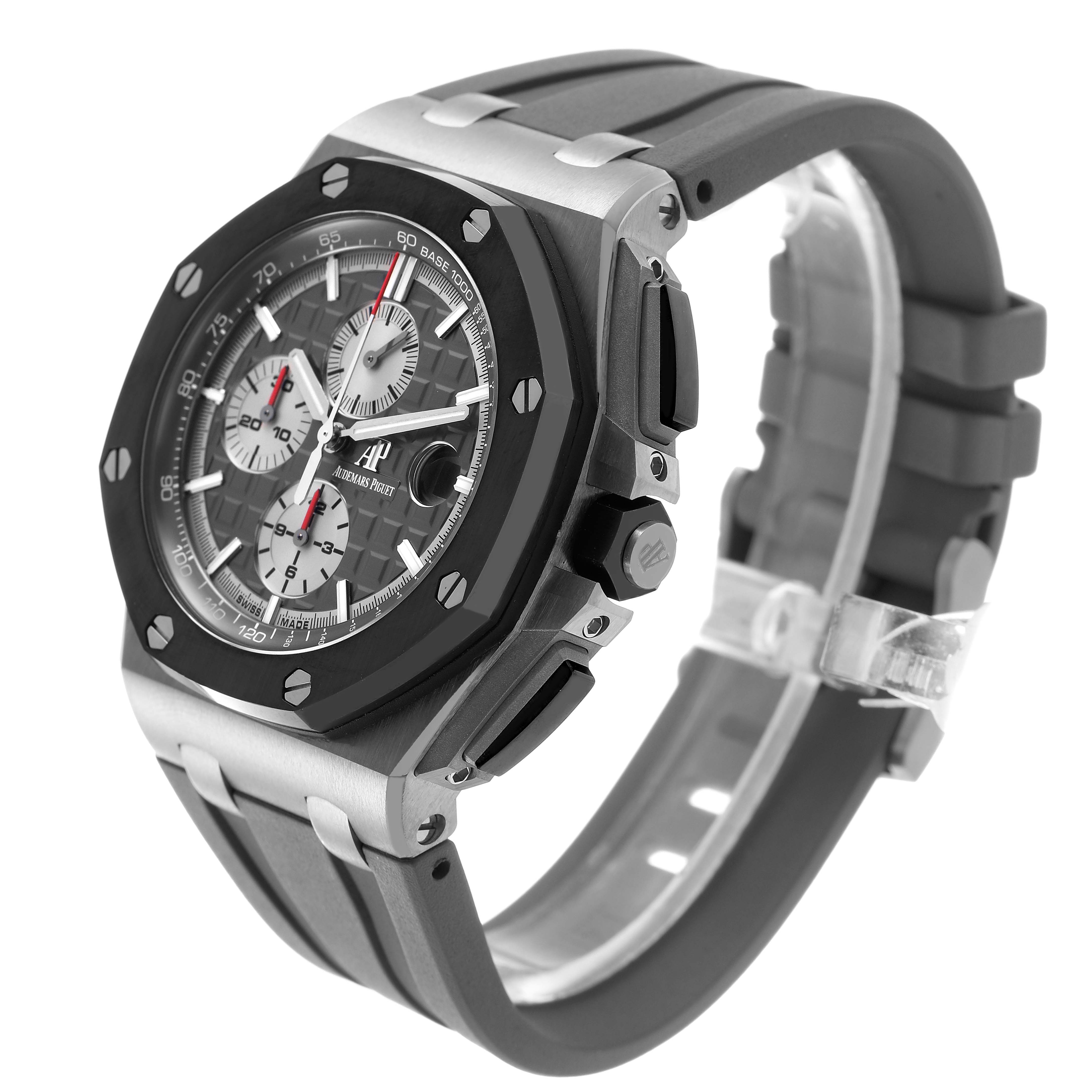 The Audemars Piguet Royal Oak Offshore 26400IO.OO.A004CA.01 Men's Titanium Grey Dial watch is shown at a three-quarter angle, highlighting the bezel, chronograph, and rubber strap.